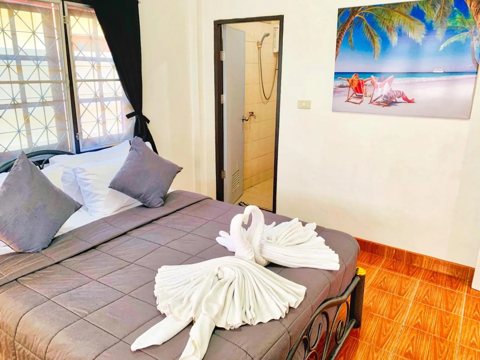 Bed in Thai Orange Villas