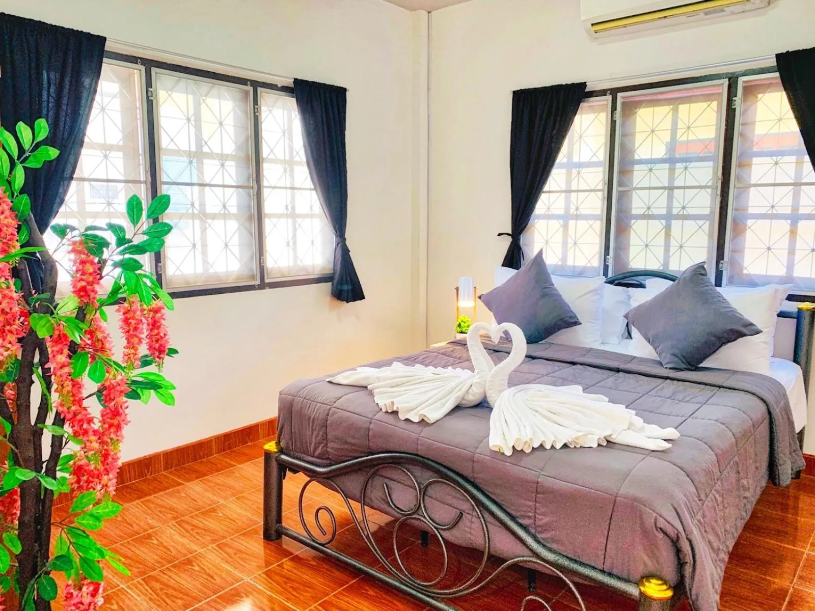 Bed in Thai Orange Villas