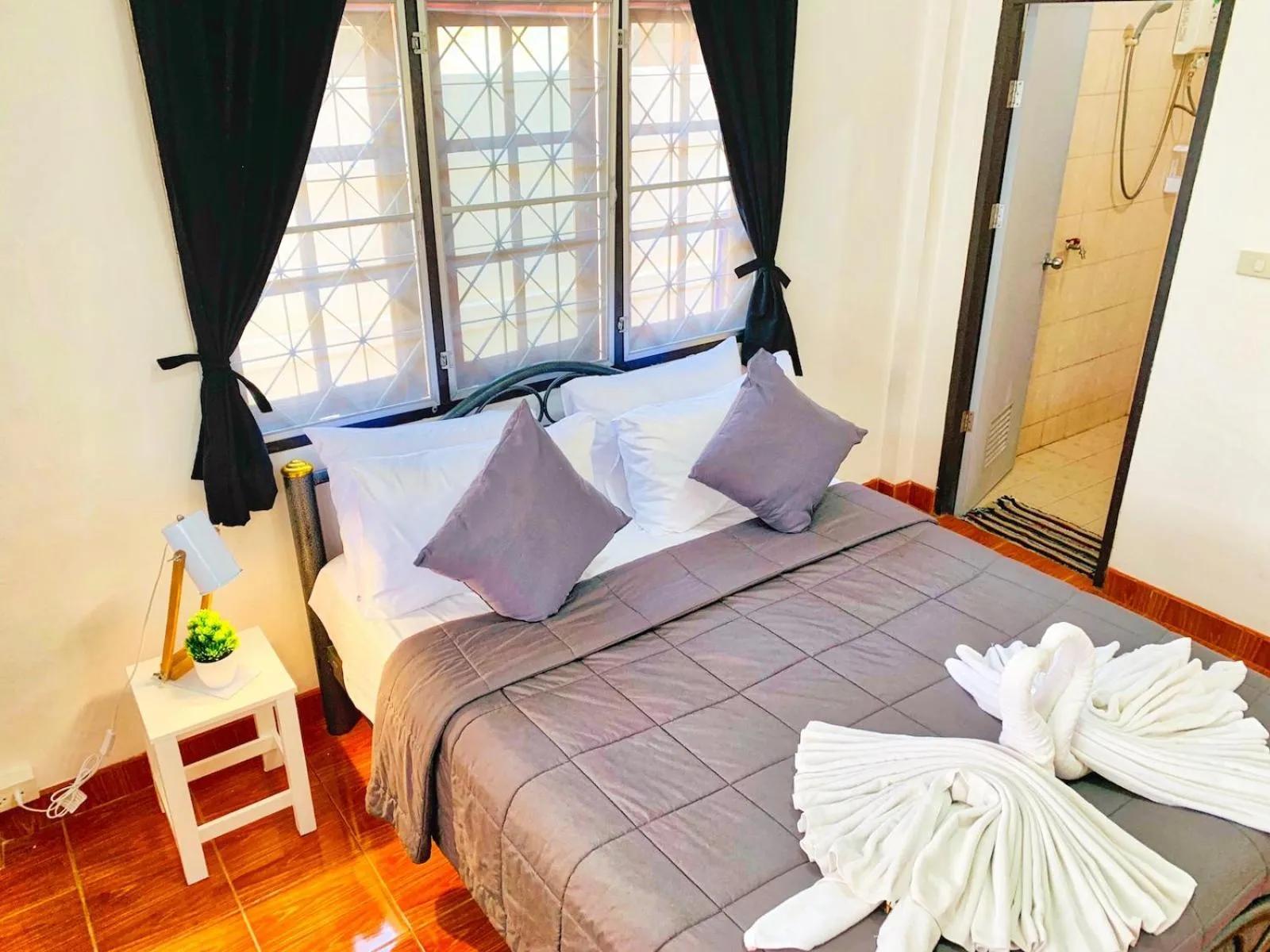 Bed in Thai Orange Villas