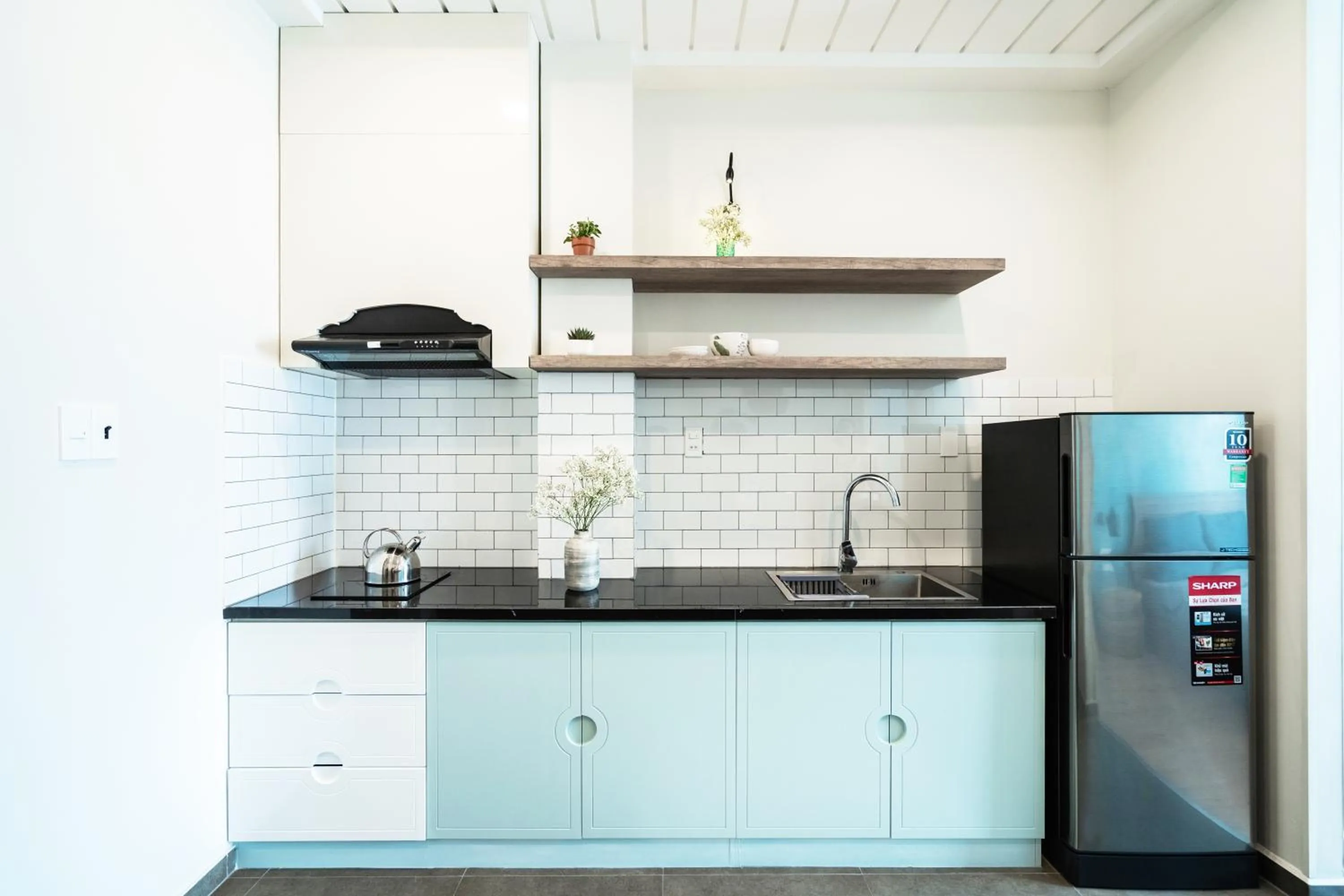 Kitchen or kitchenette in Mecozy Apartel