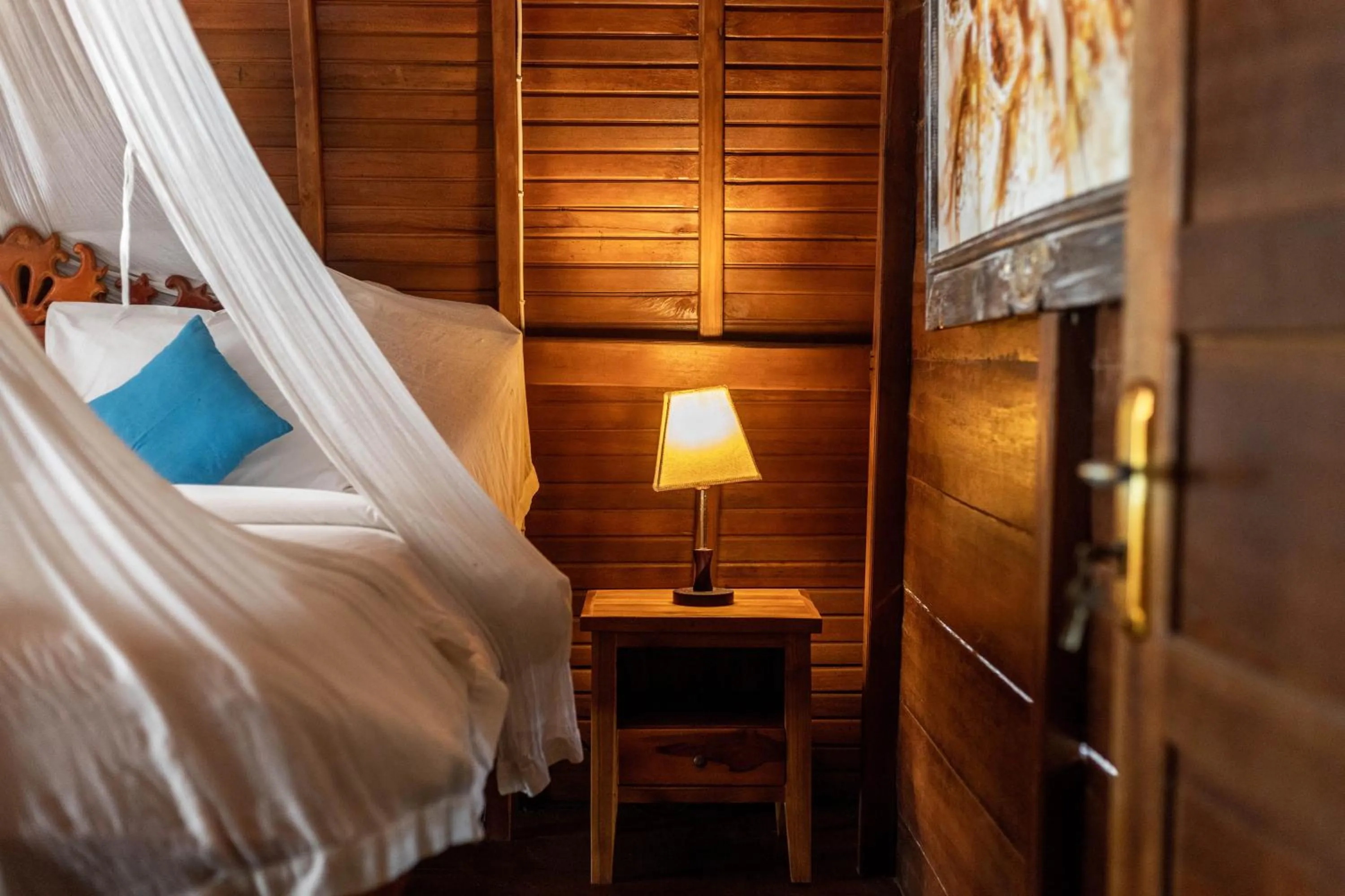 Decorative detail, Bed in Sukawati Inn at Crystal Bay