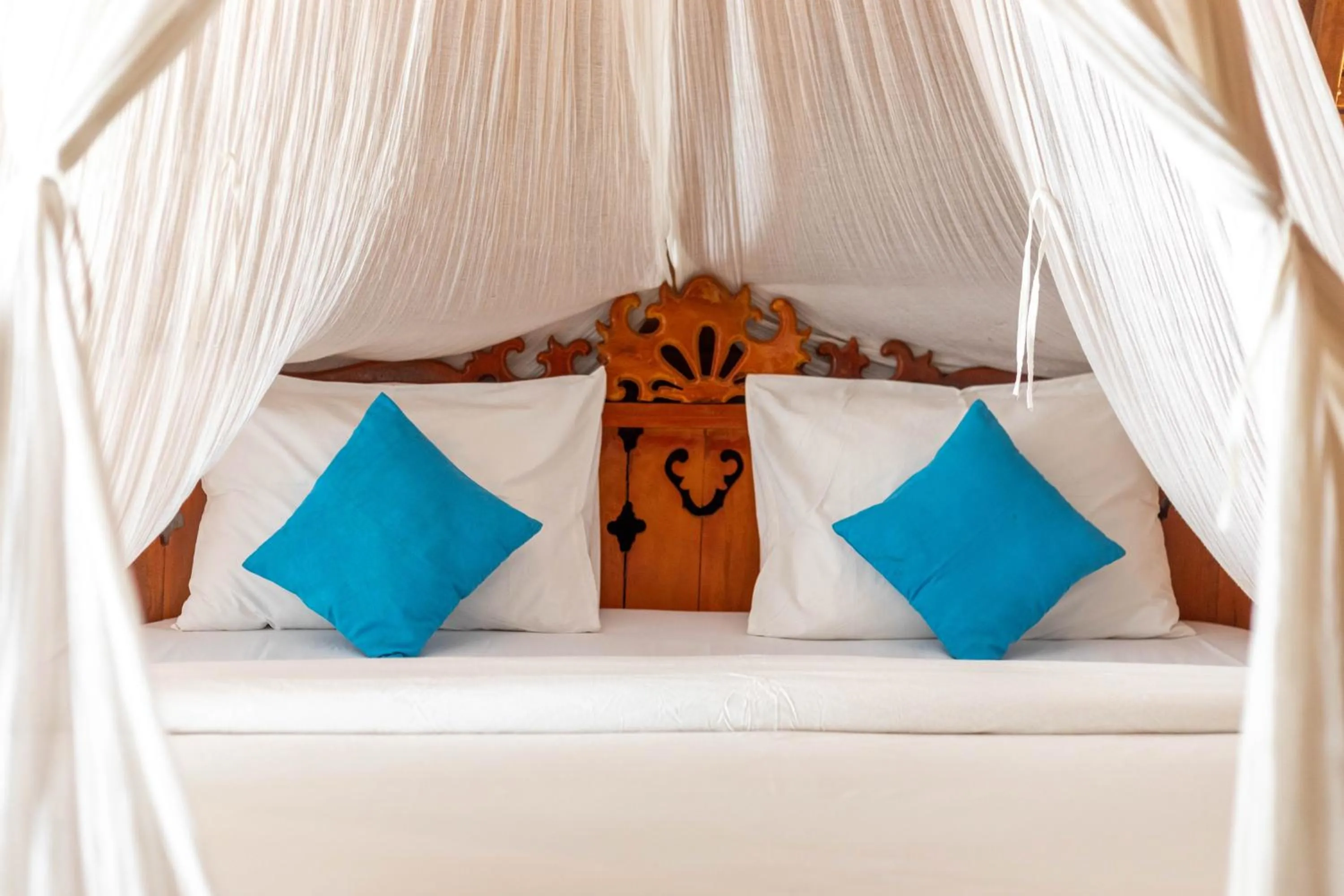 Bed in Sukawati Inn at Crystal Bay