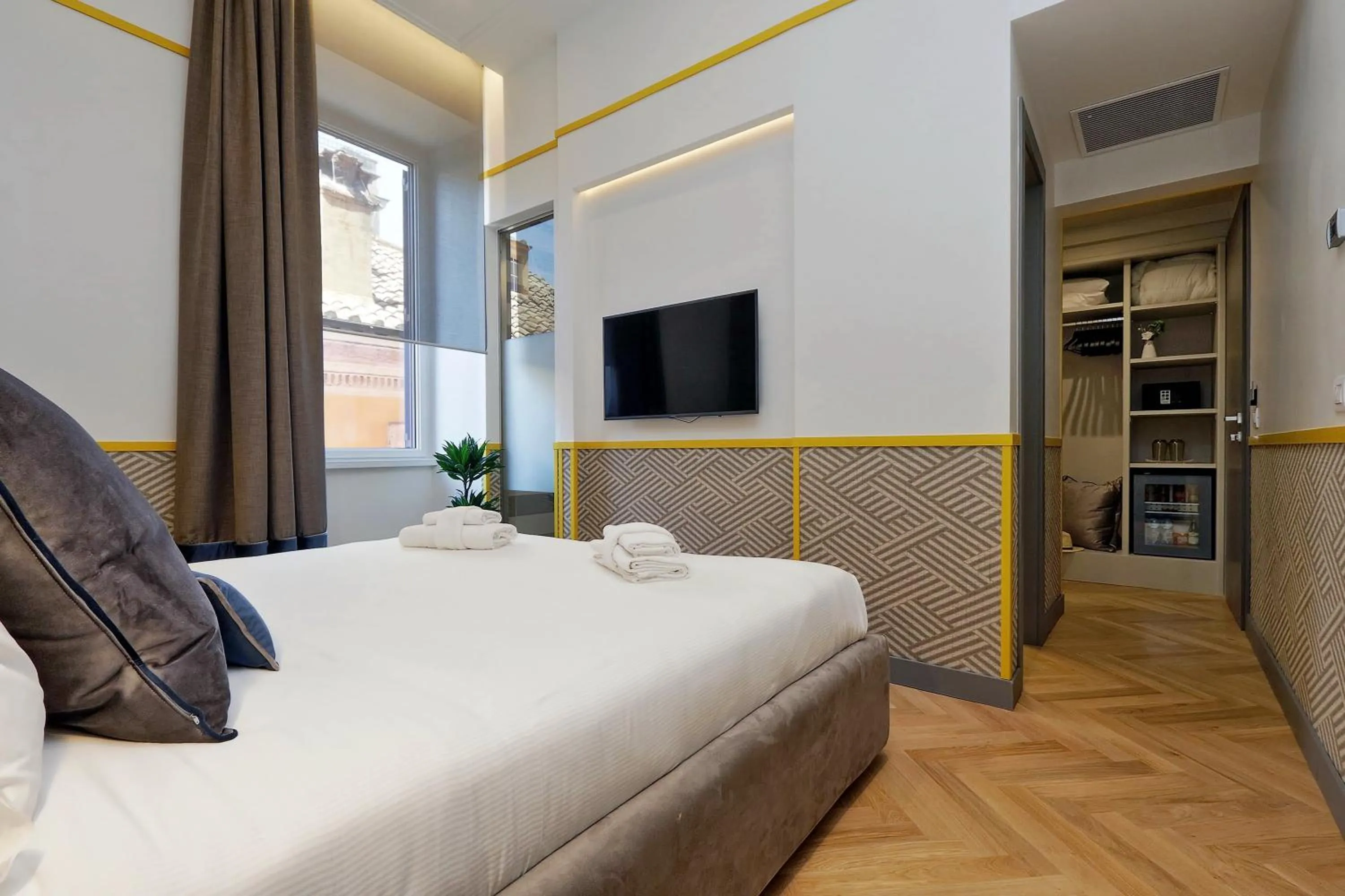 Bed in Roma Five Suites