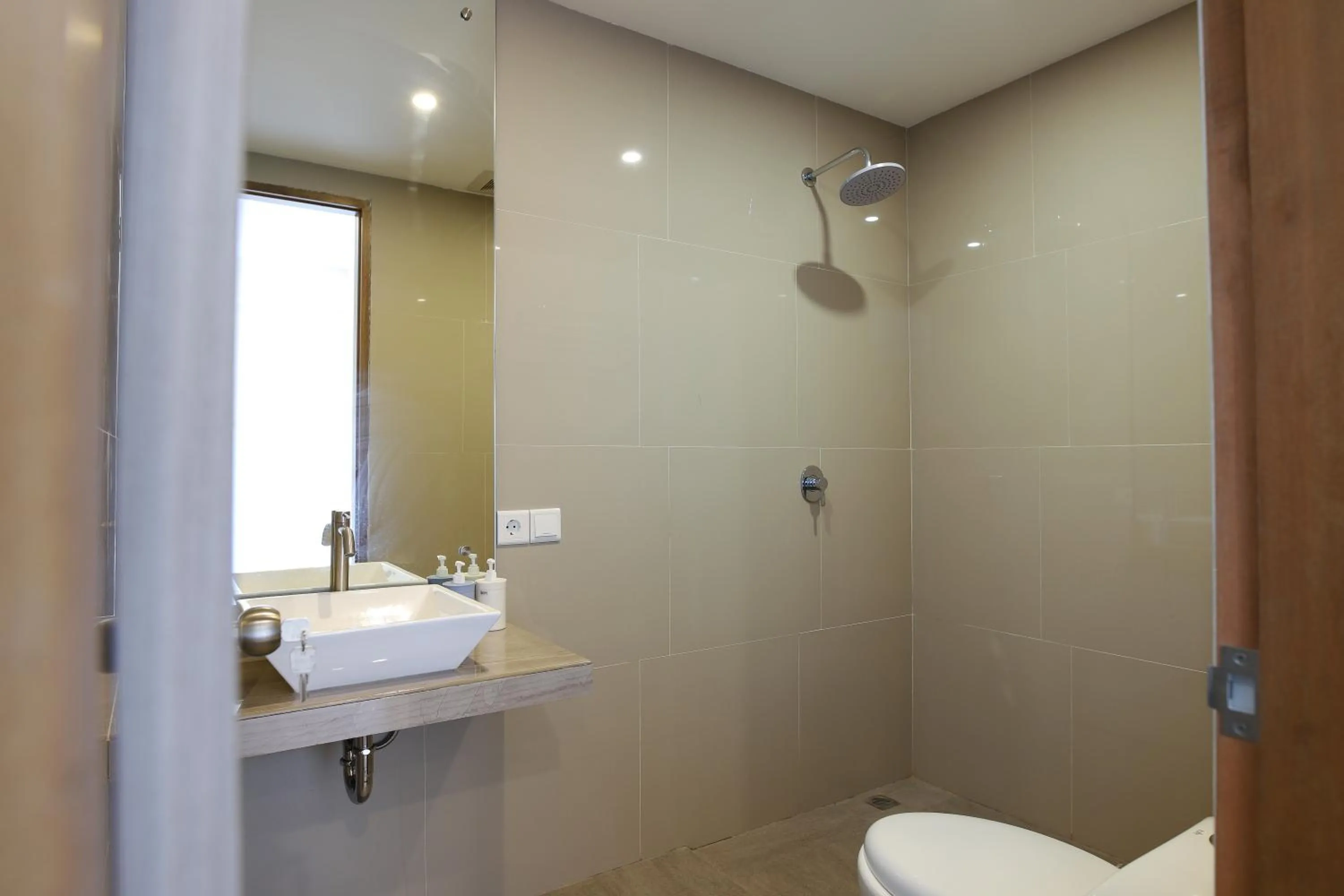 Shower in GM Guest House Canggu