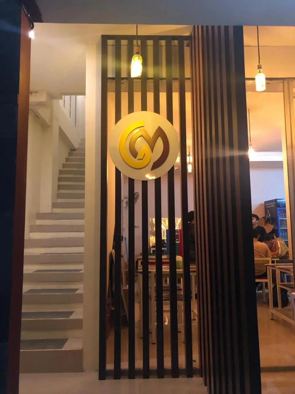 Facade/entrance in GM Guest House Canggu