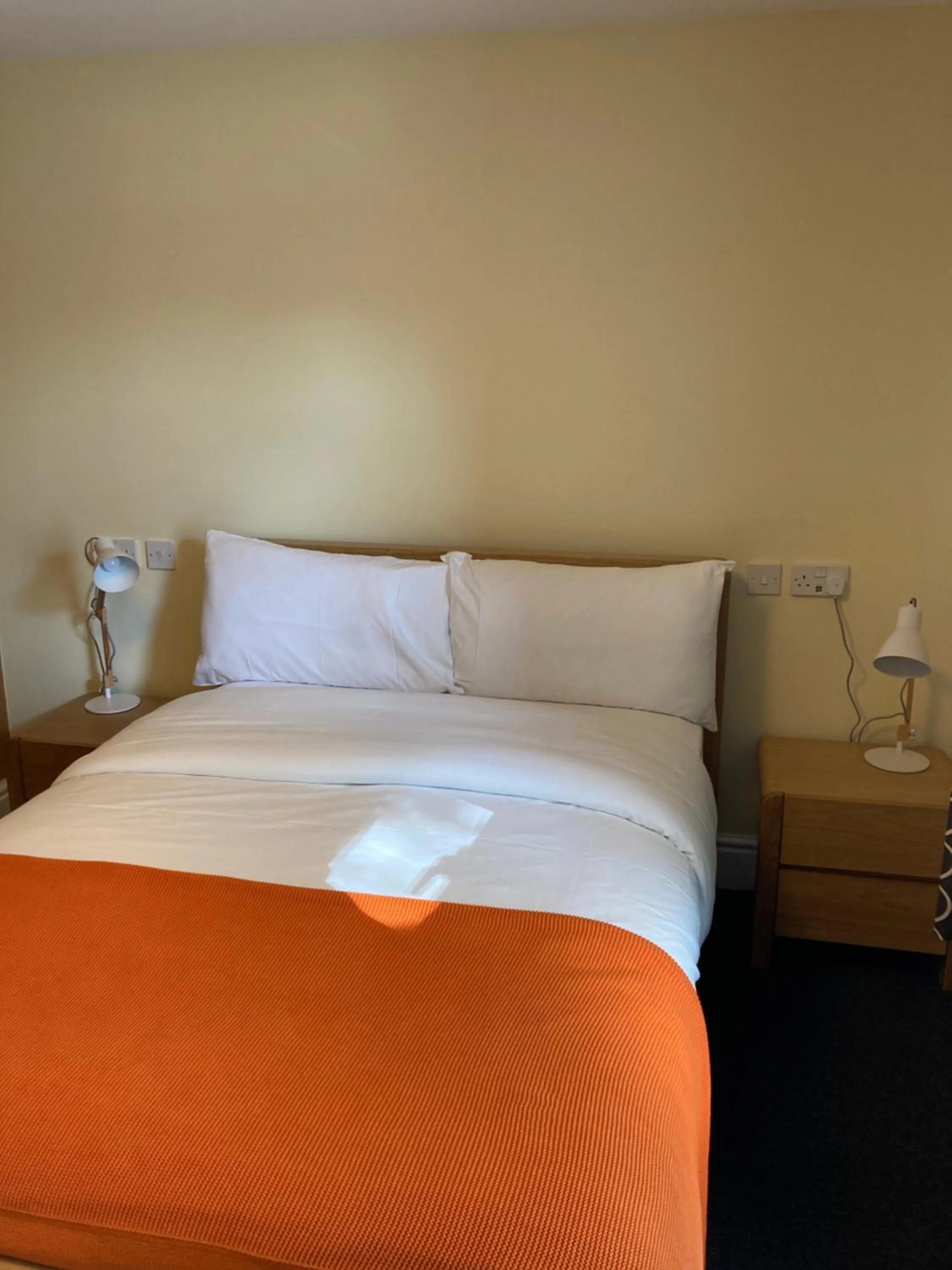 Bed in Newell Bistro and Rooms