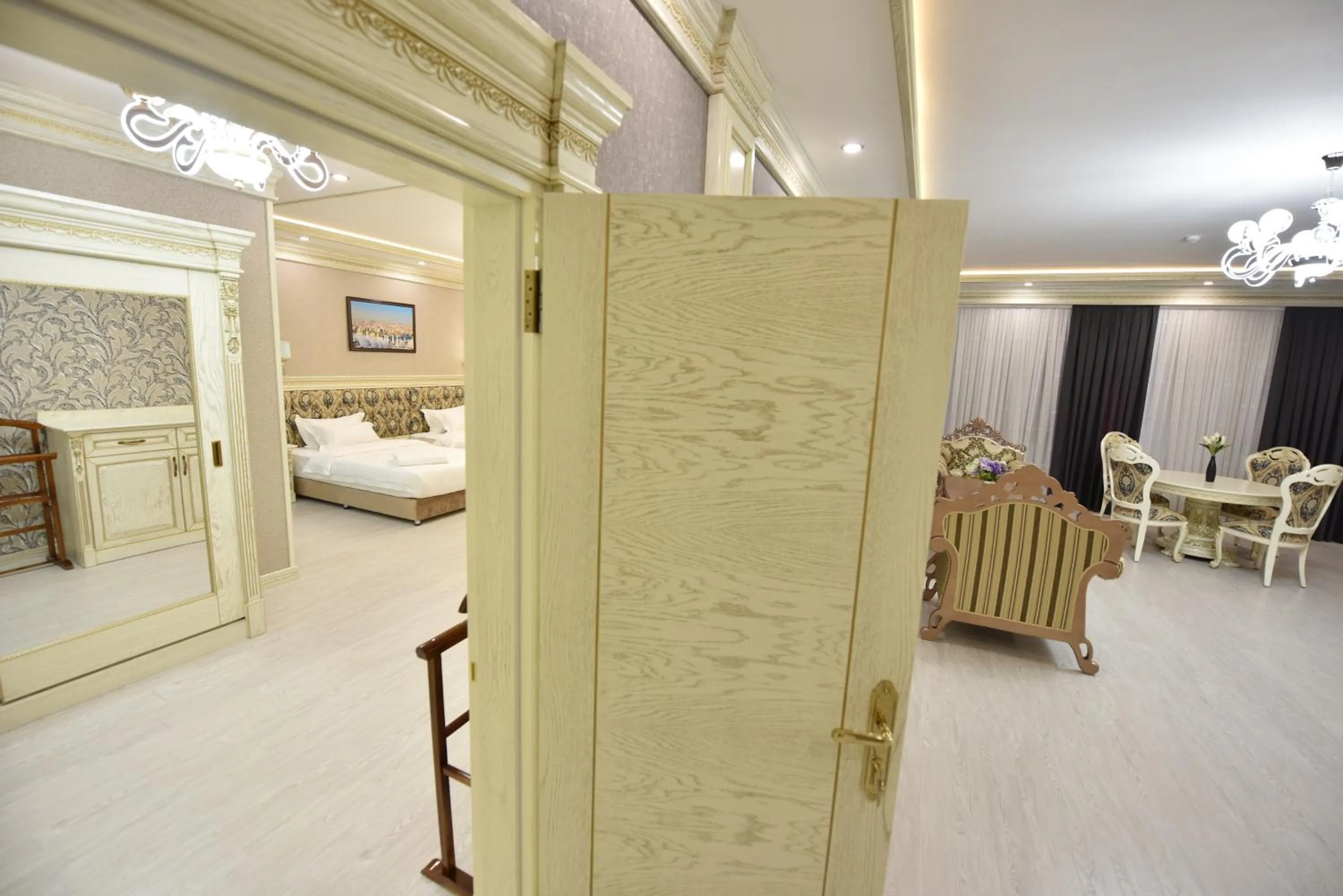 Living room, Bed in Simma Hotel Spa & Waterpark