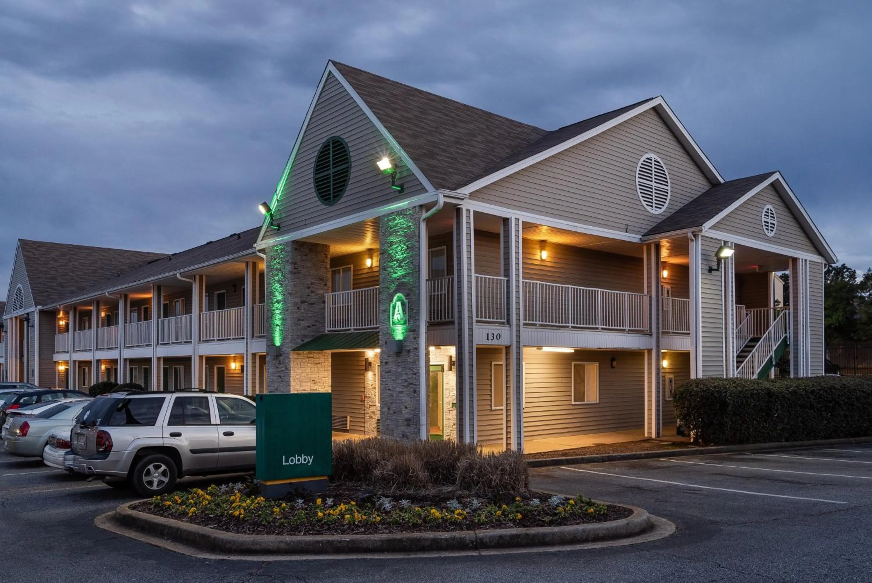 Property building in HomeTowne Studios by Red Roof Spartanburg - Asheville Highway