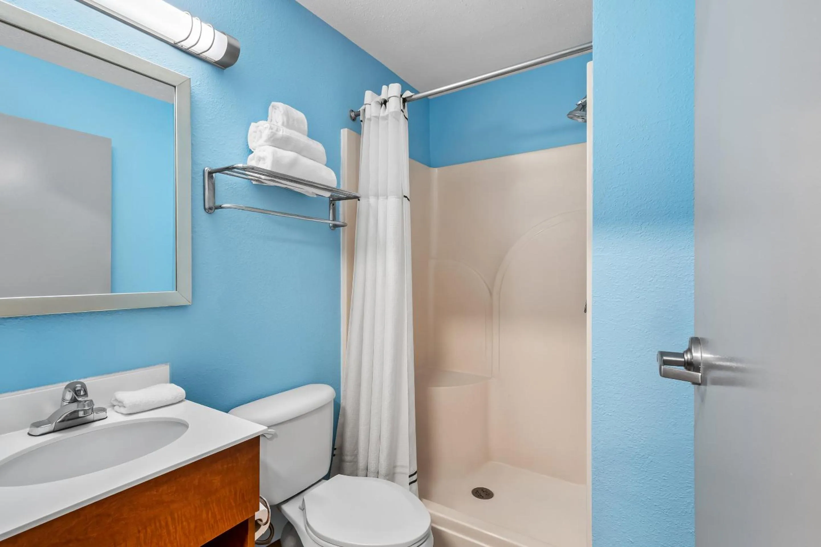 Bathroom in HomeTowne Studios by Red Roof Detroit - Livonia