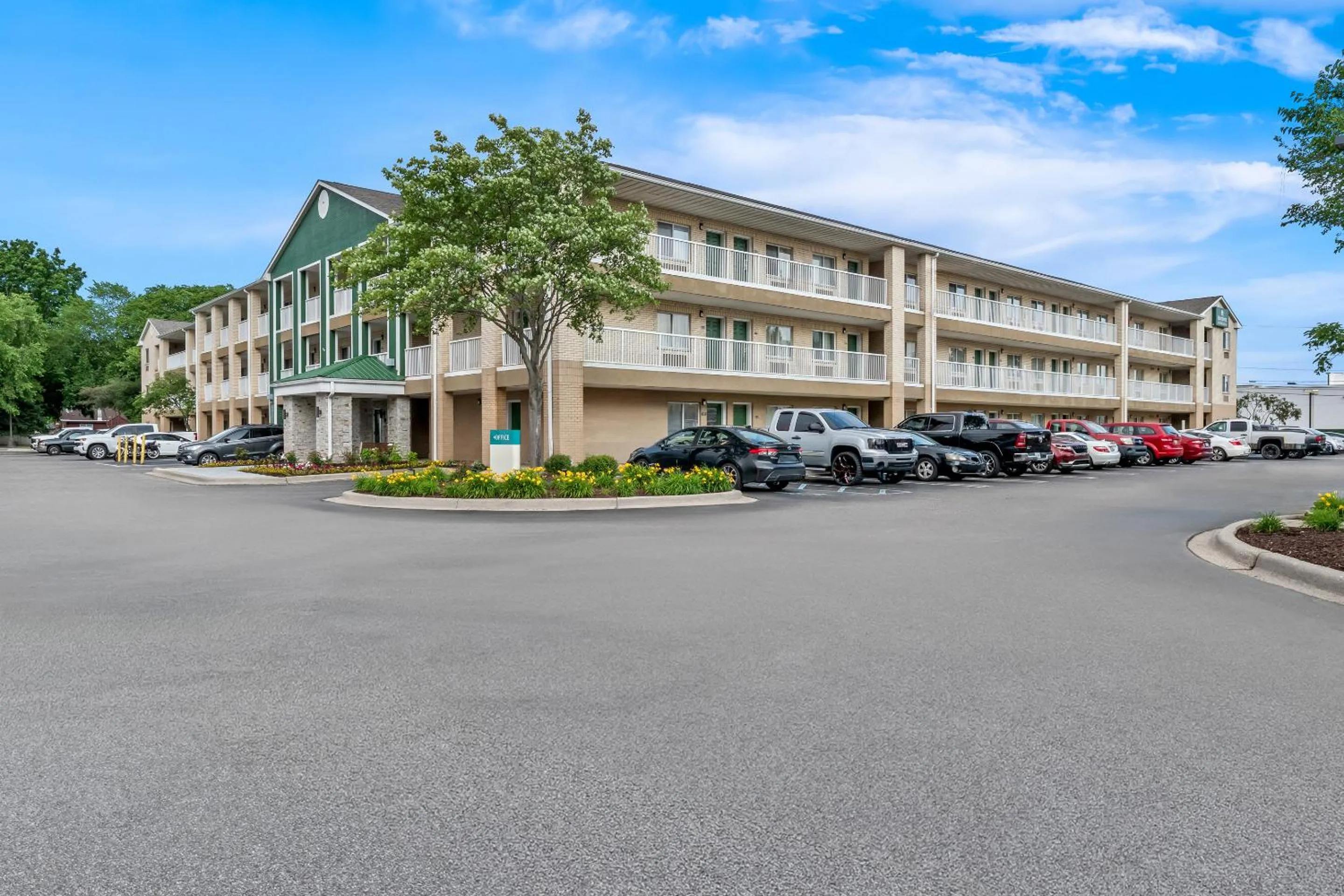 Property building in HomeTowne Studios by Red Roof Detroit - Livonia