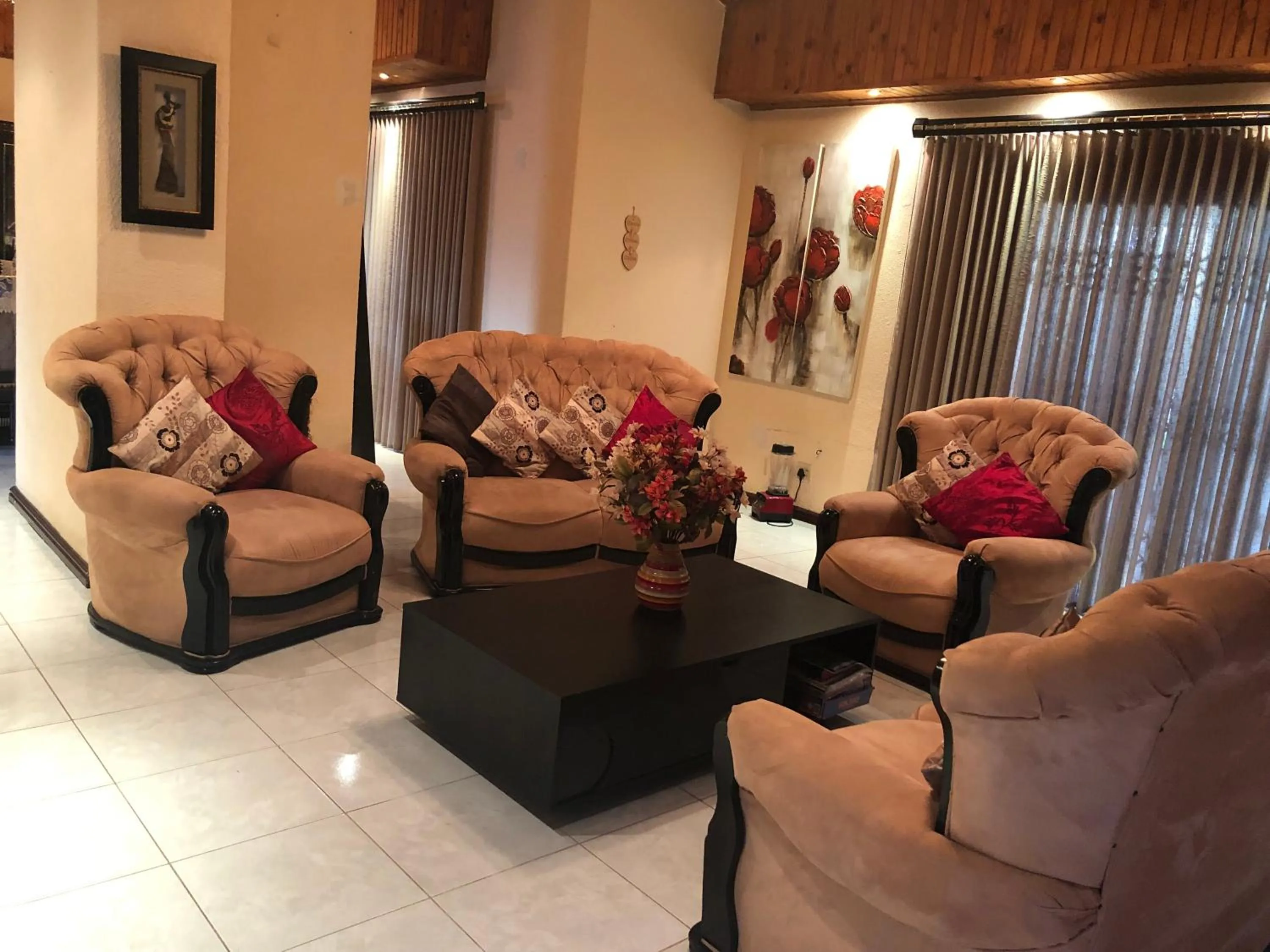 Communal lounge/ TV room in Naomi's Place