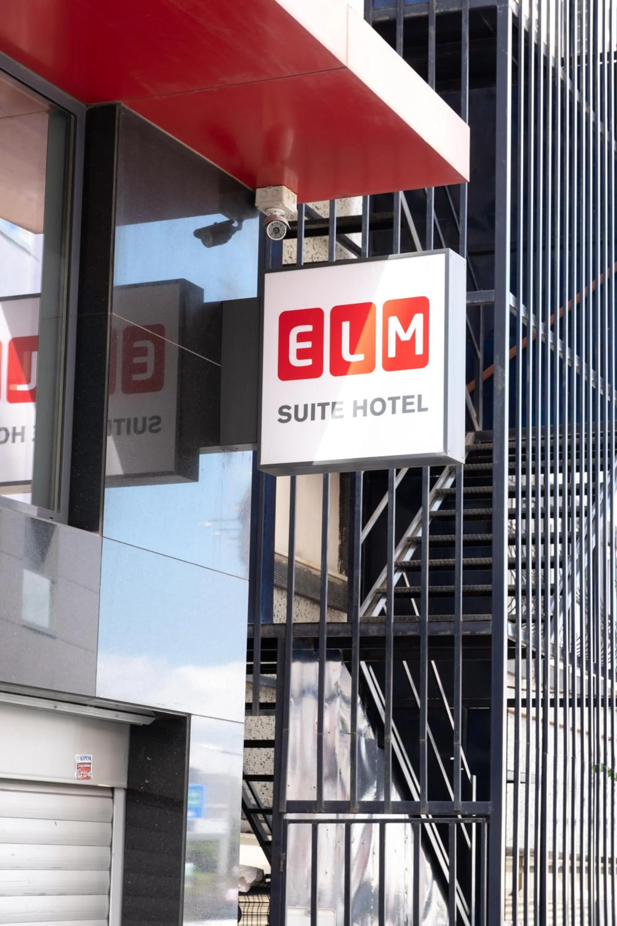 Property logo or sign in Elm Suite Hotel