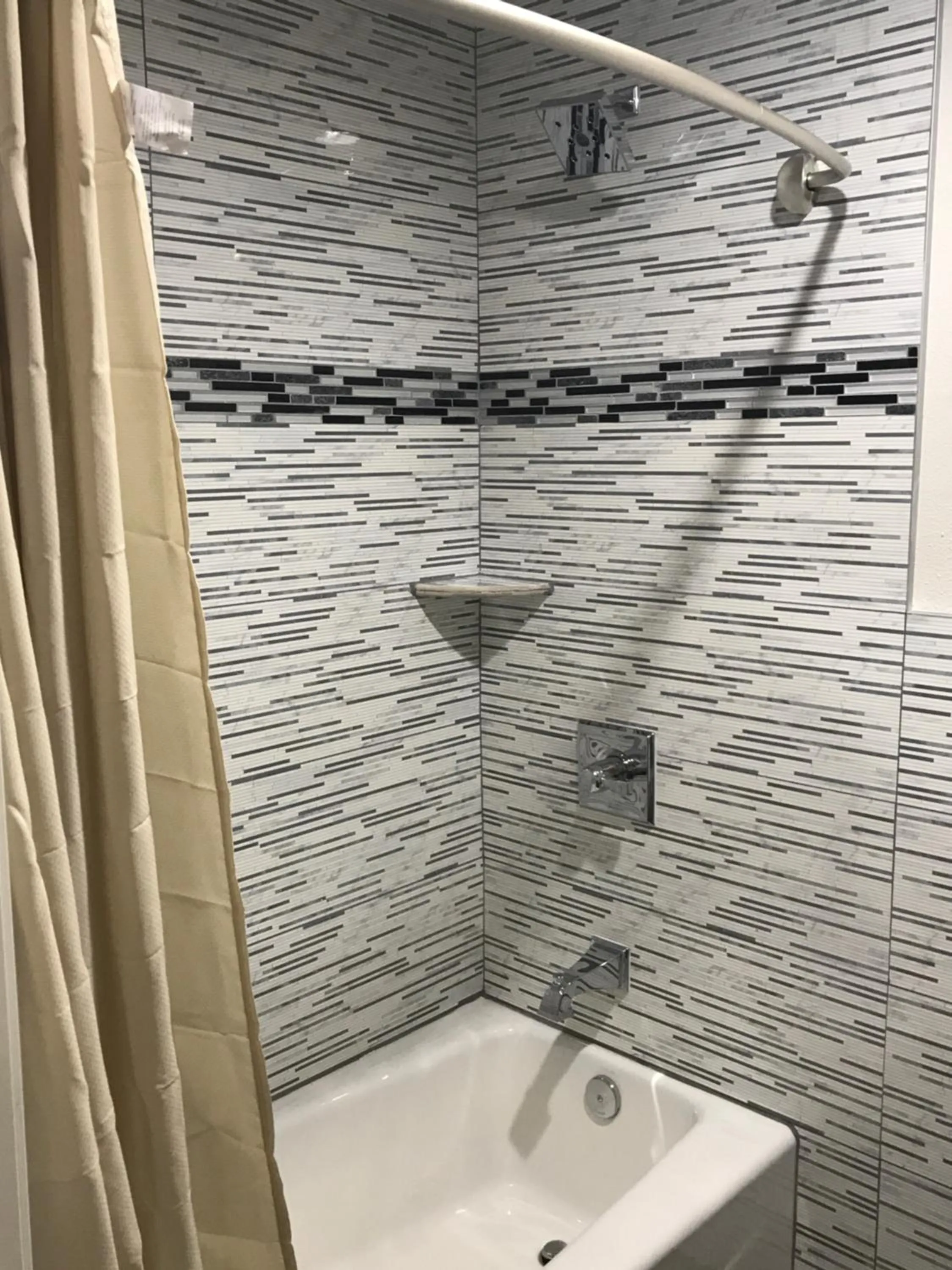 Shower in Executive Suites Inn