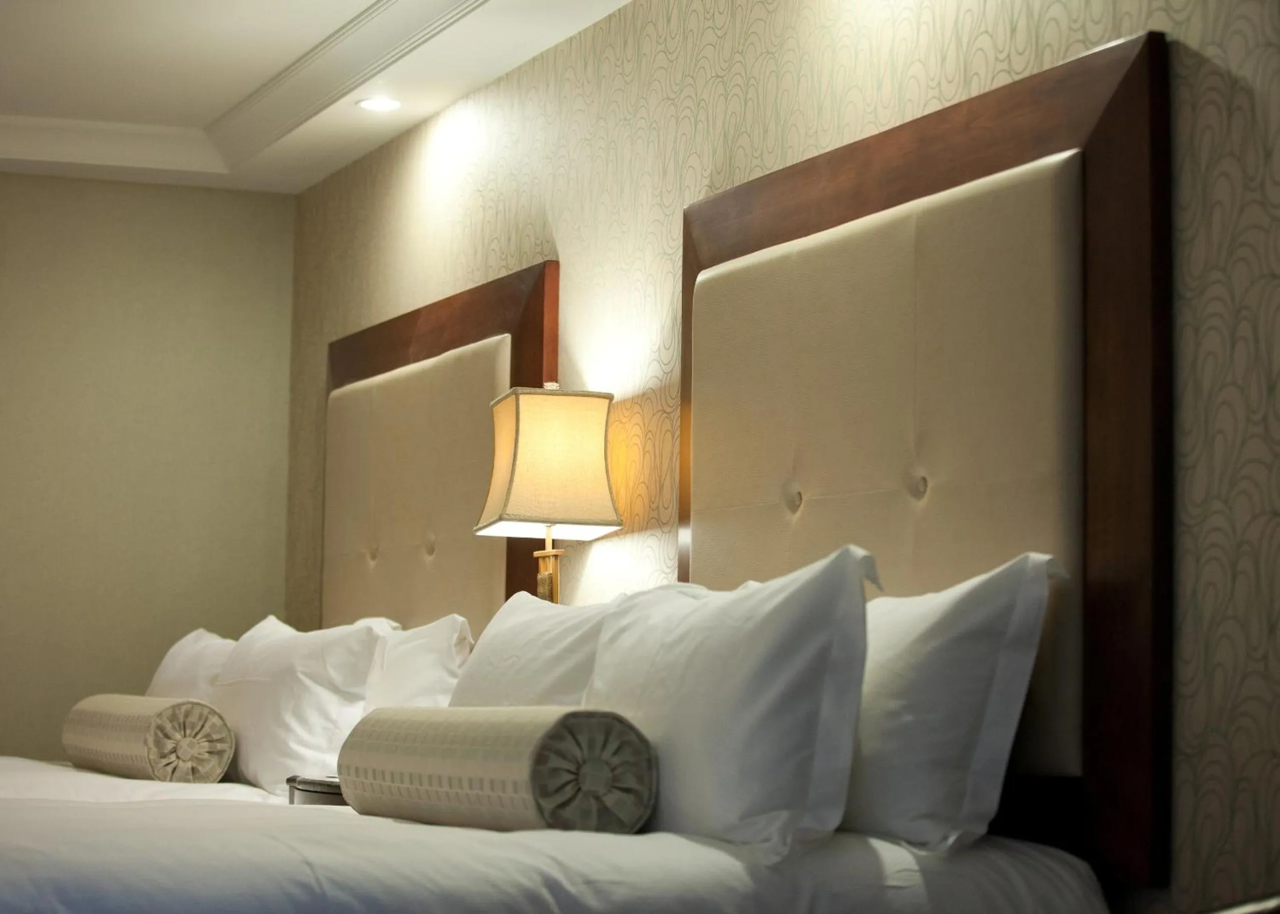 Bedroom in Town & Country Inn and Suites