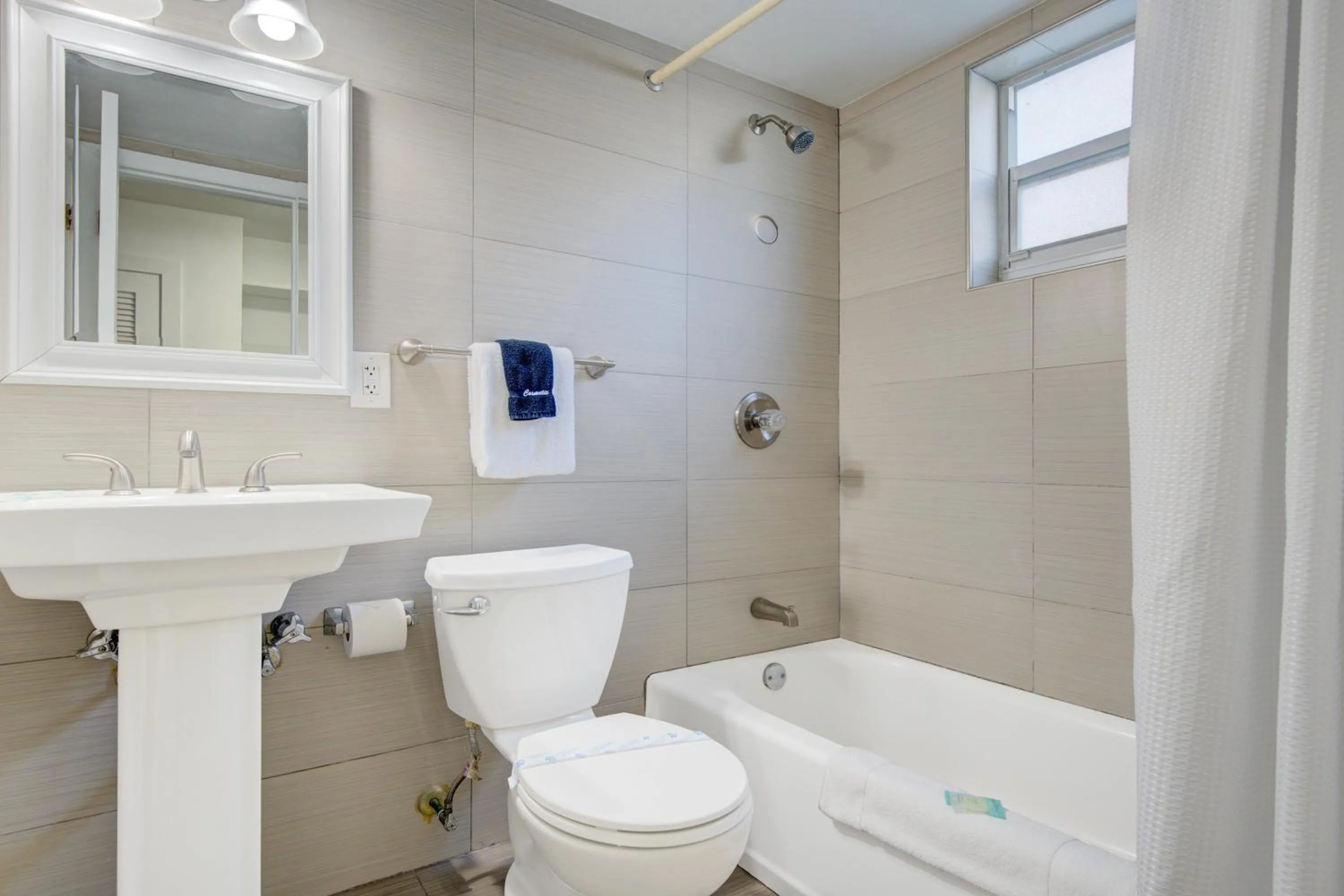 Bathroom in Leeward Motel By Capital O North Miami Beachside