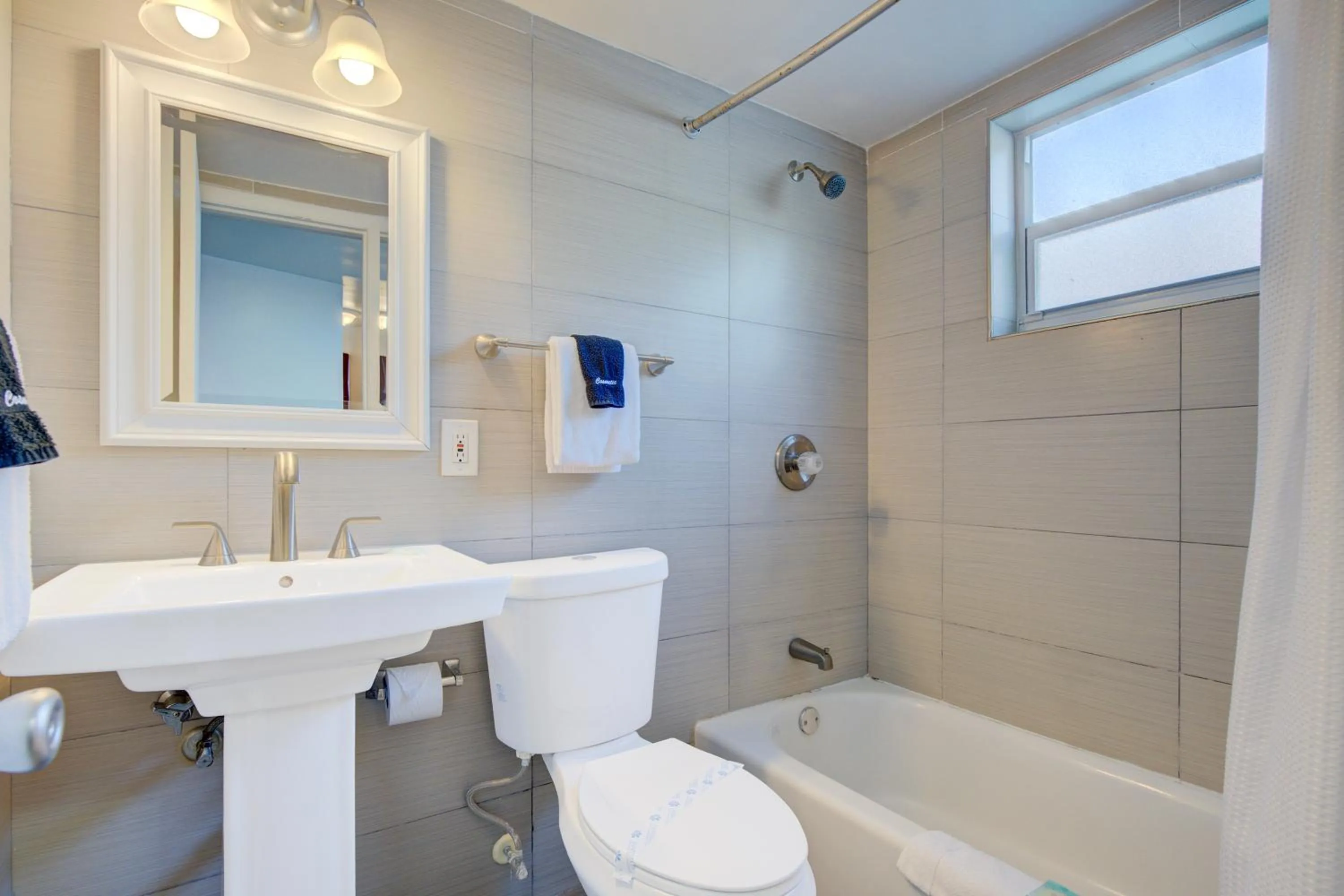 Bathroom in Leeward Motel By Capital O North Miami Beachside