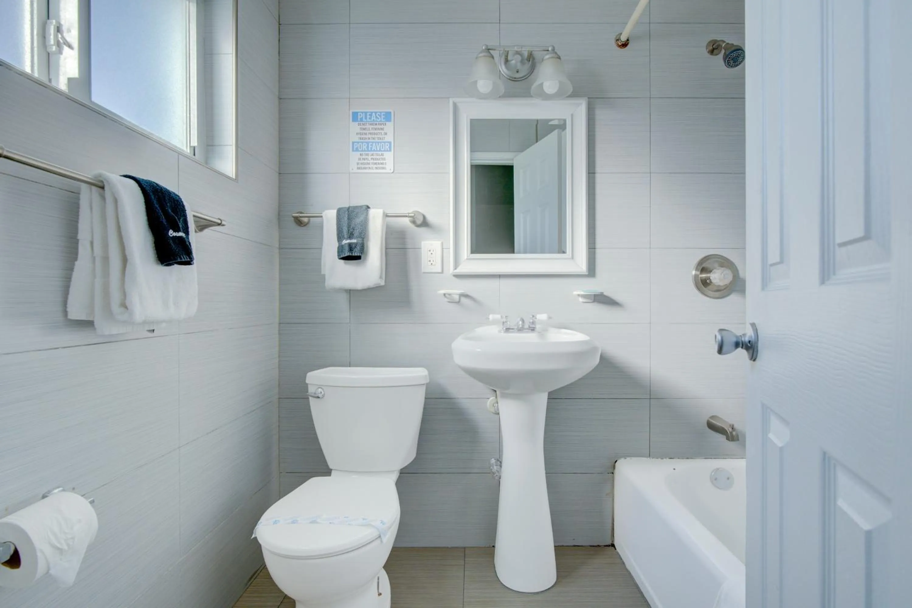 Bathroom in Leeward Motel By Capital O North Miami Beachside