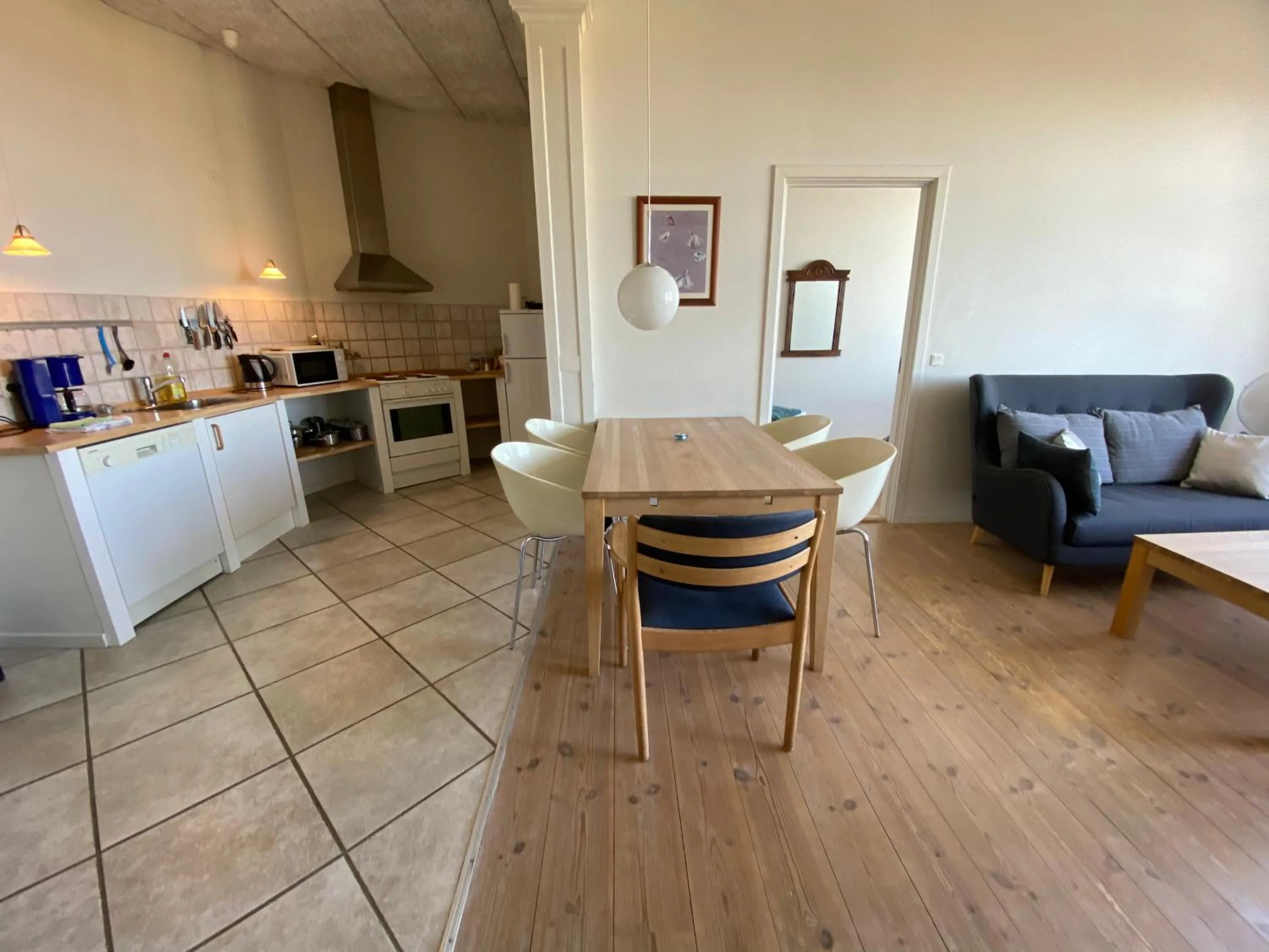 Kitchen or kitchenette in Skærven Beachfront Apartments and Cottage