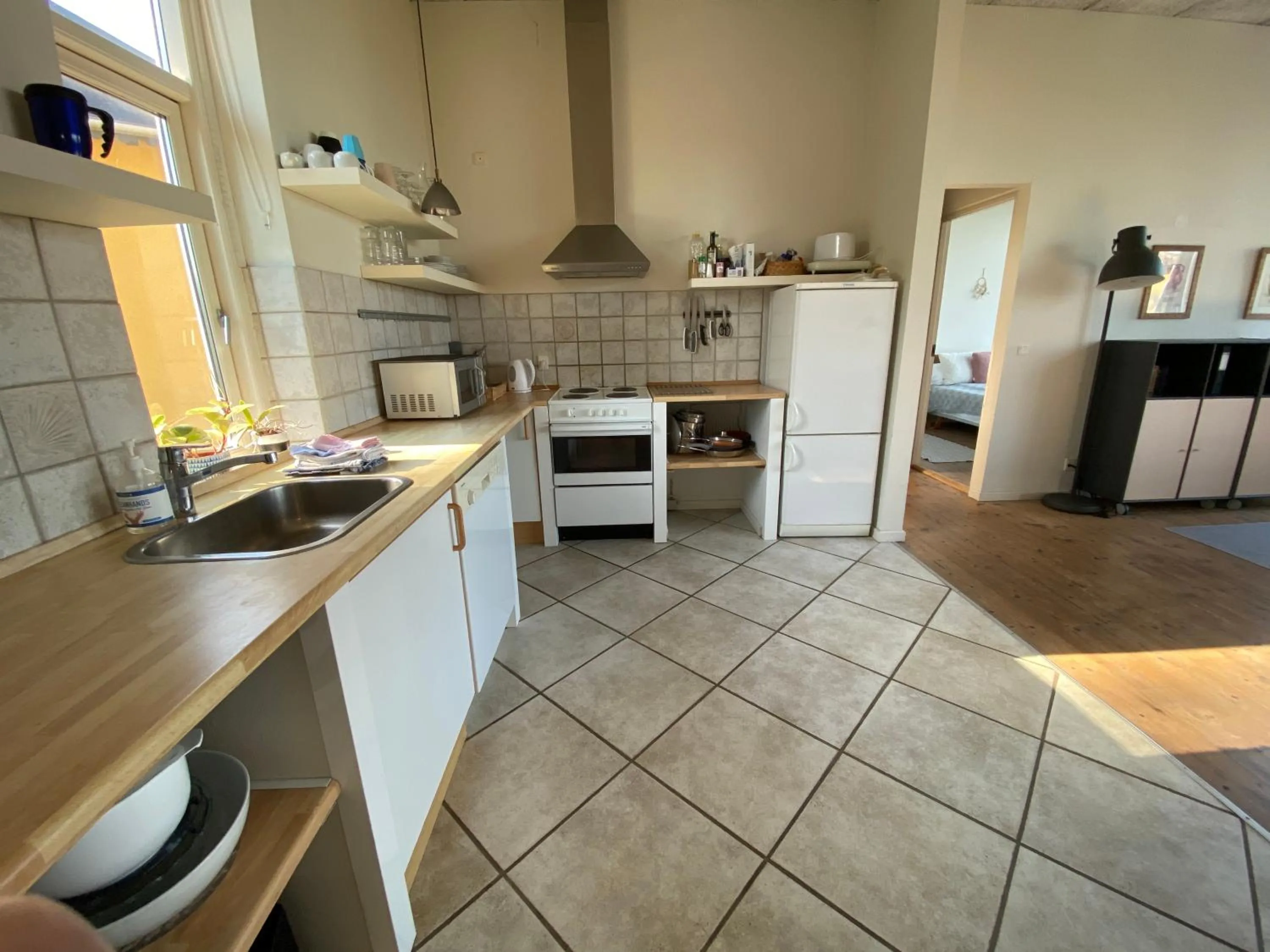 Kitchen or kitchenette in Skærven Beachfront Apartments and Cottage