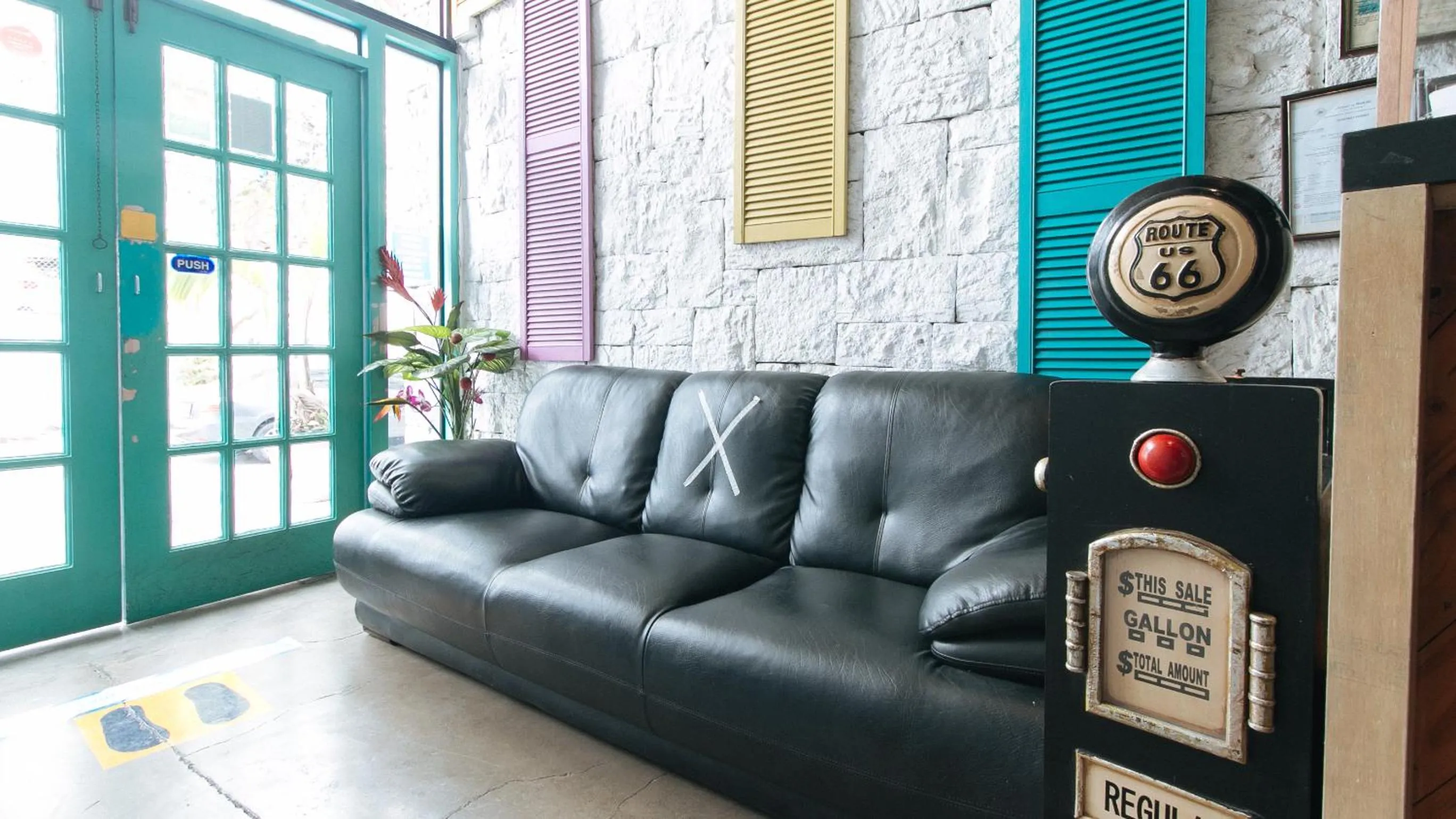 Seating area in RedDoorz Plus at BGC near St Lukes