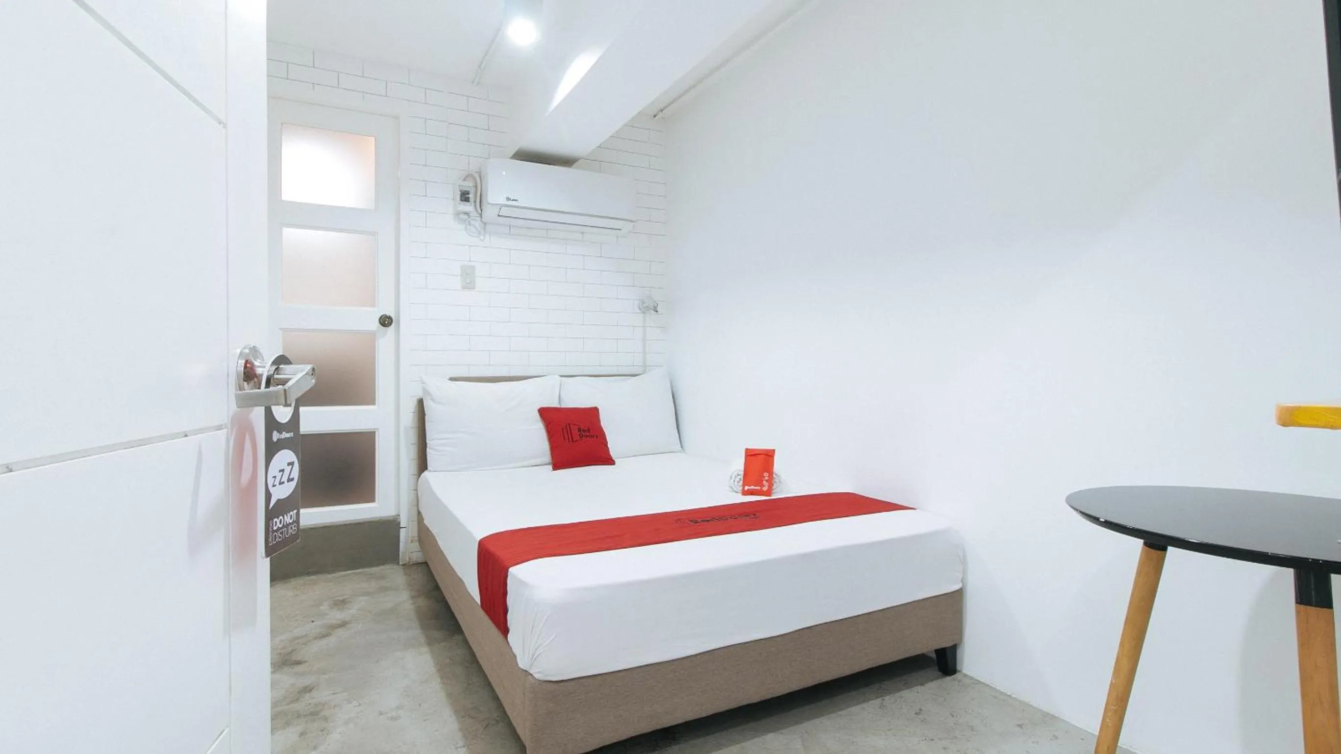 Bedroom, Bed in RedDoorz Plus at BGC near St Lukes