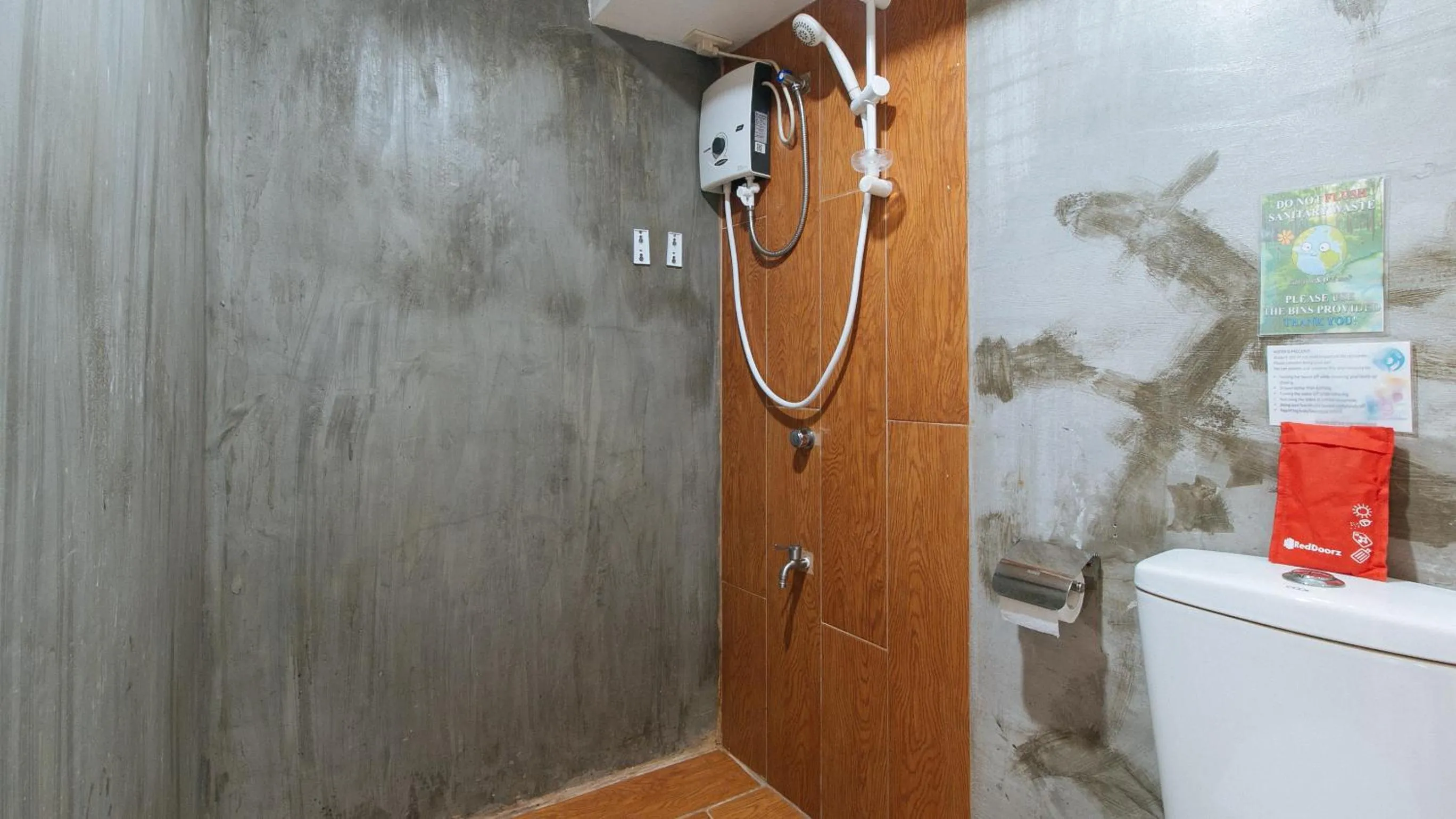 Shower in RedDoorz Plus at BGC near St Lukes