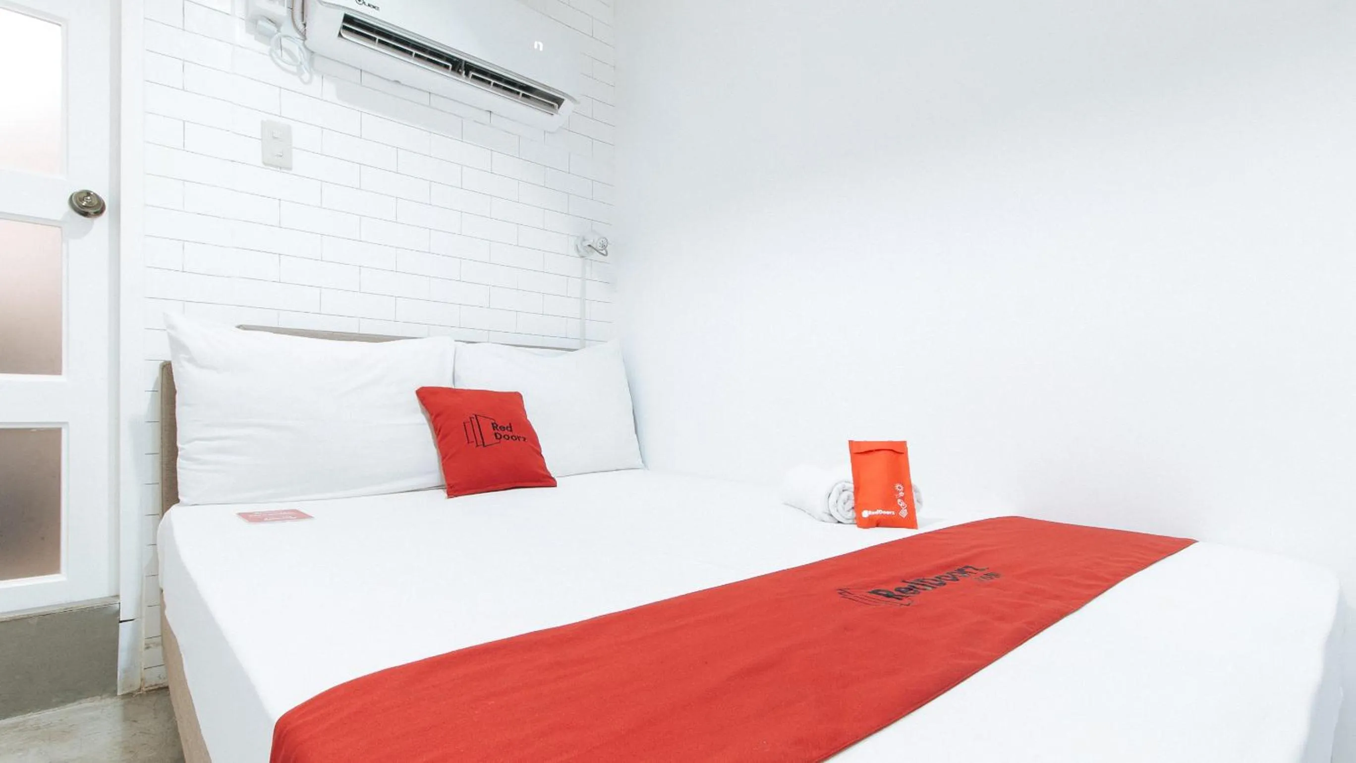 Bedroom, Bed in RedDoorz Plus at BGC near St Lukes