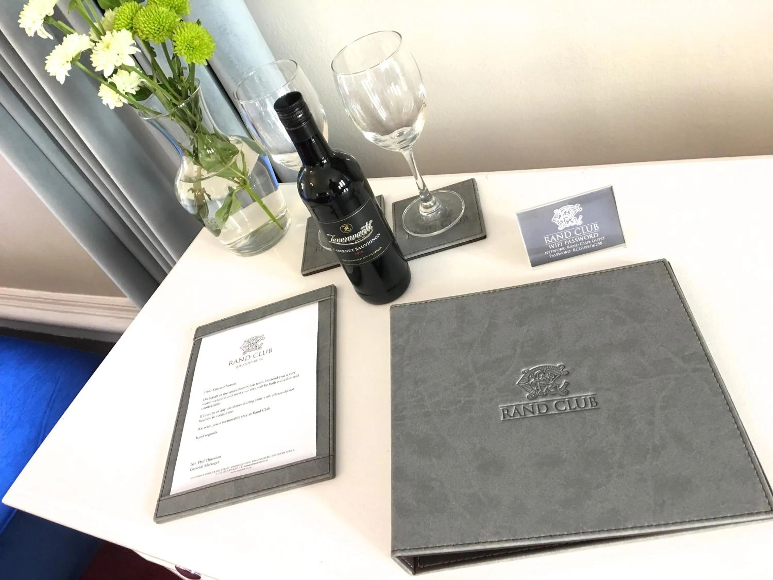 Property logo or sign in Rand Club Suites