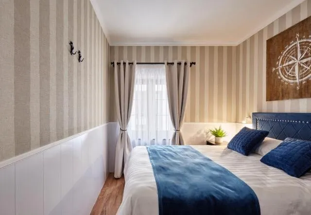 Bed in "Breeze" Aparthotel by Parrot`s House