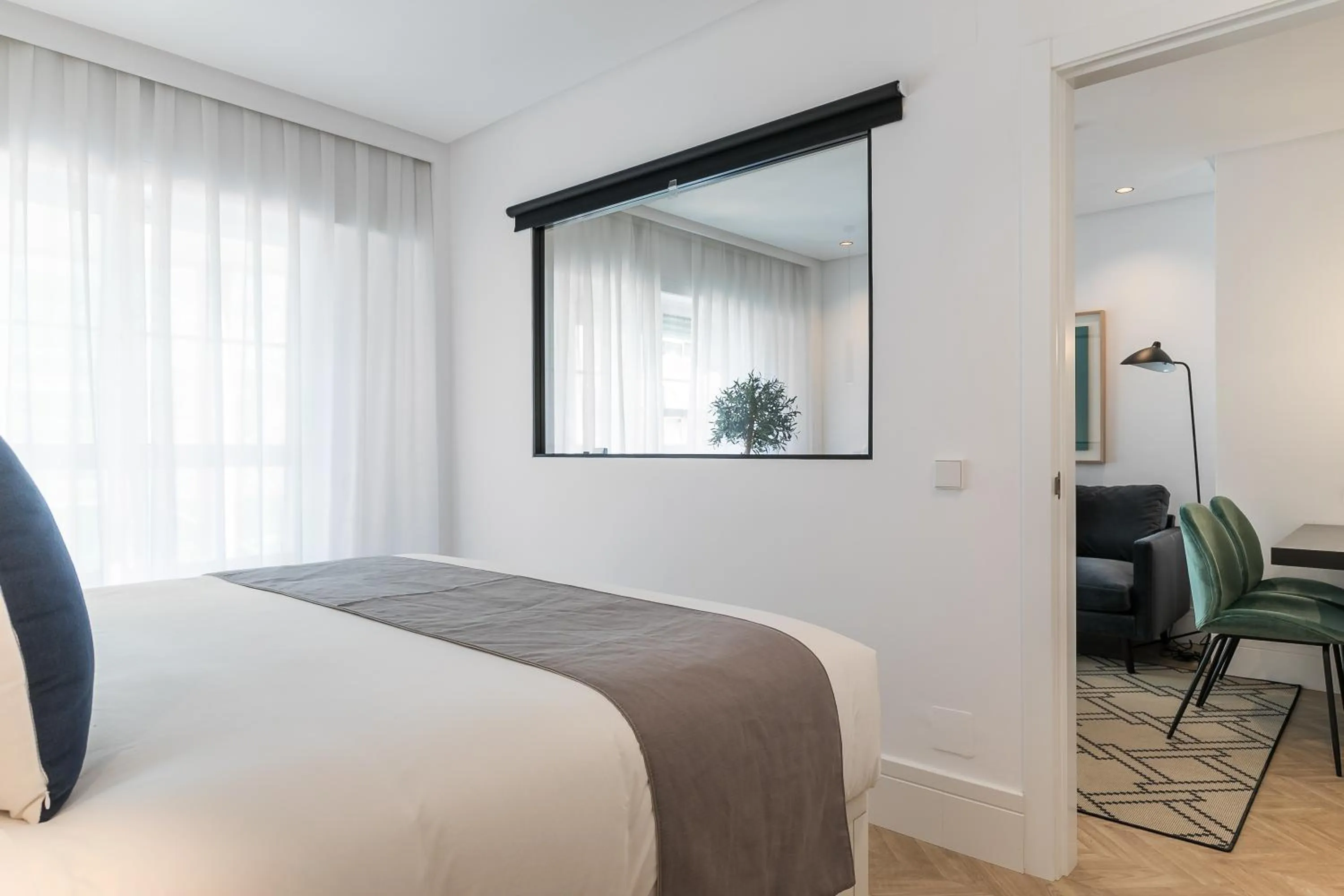 Bed in Feelathome Waldorf Suites Apartments