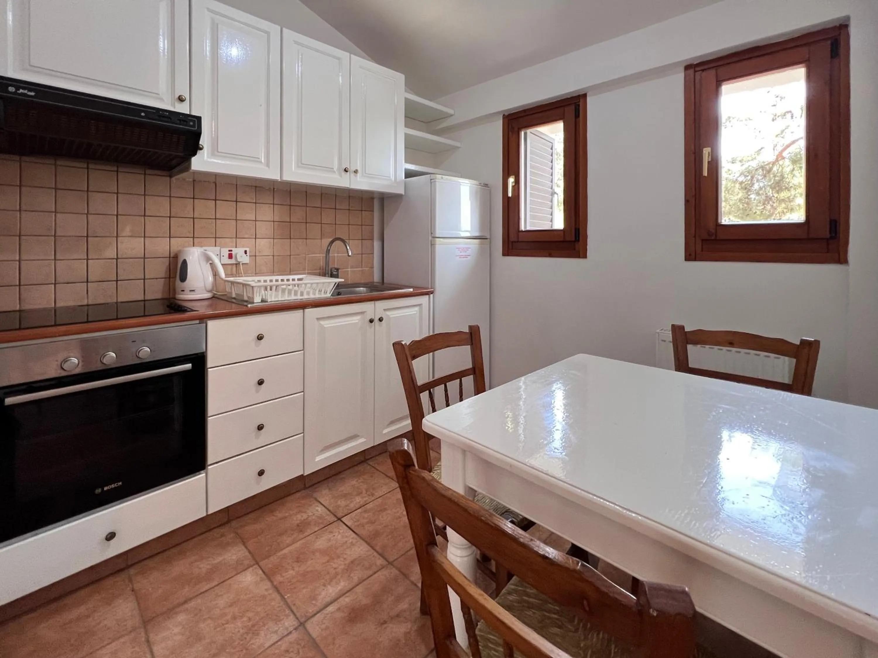 Kitchen or kitchenette in POED Residences