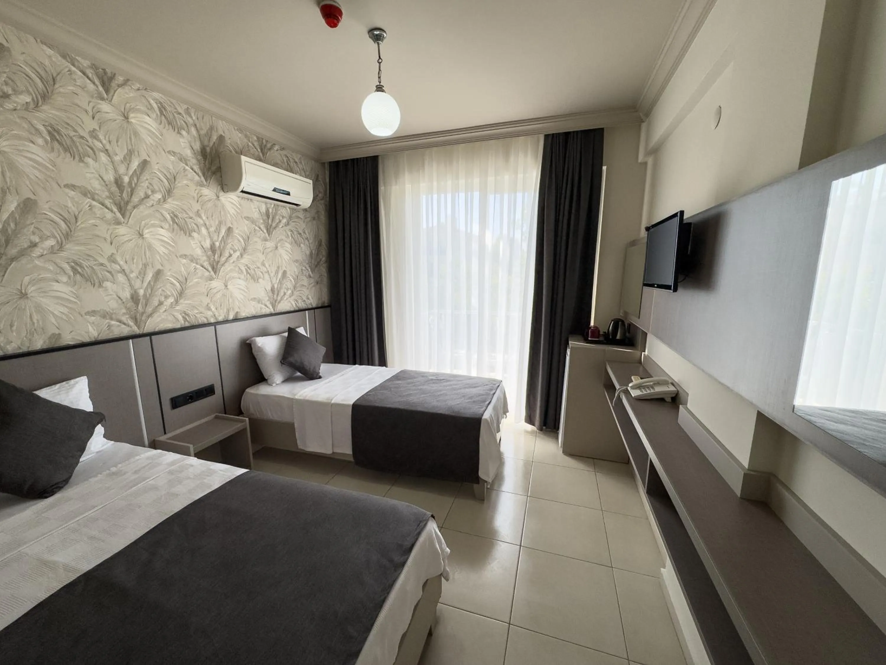 Bed in Sardunya Hotel