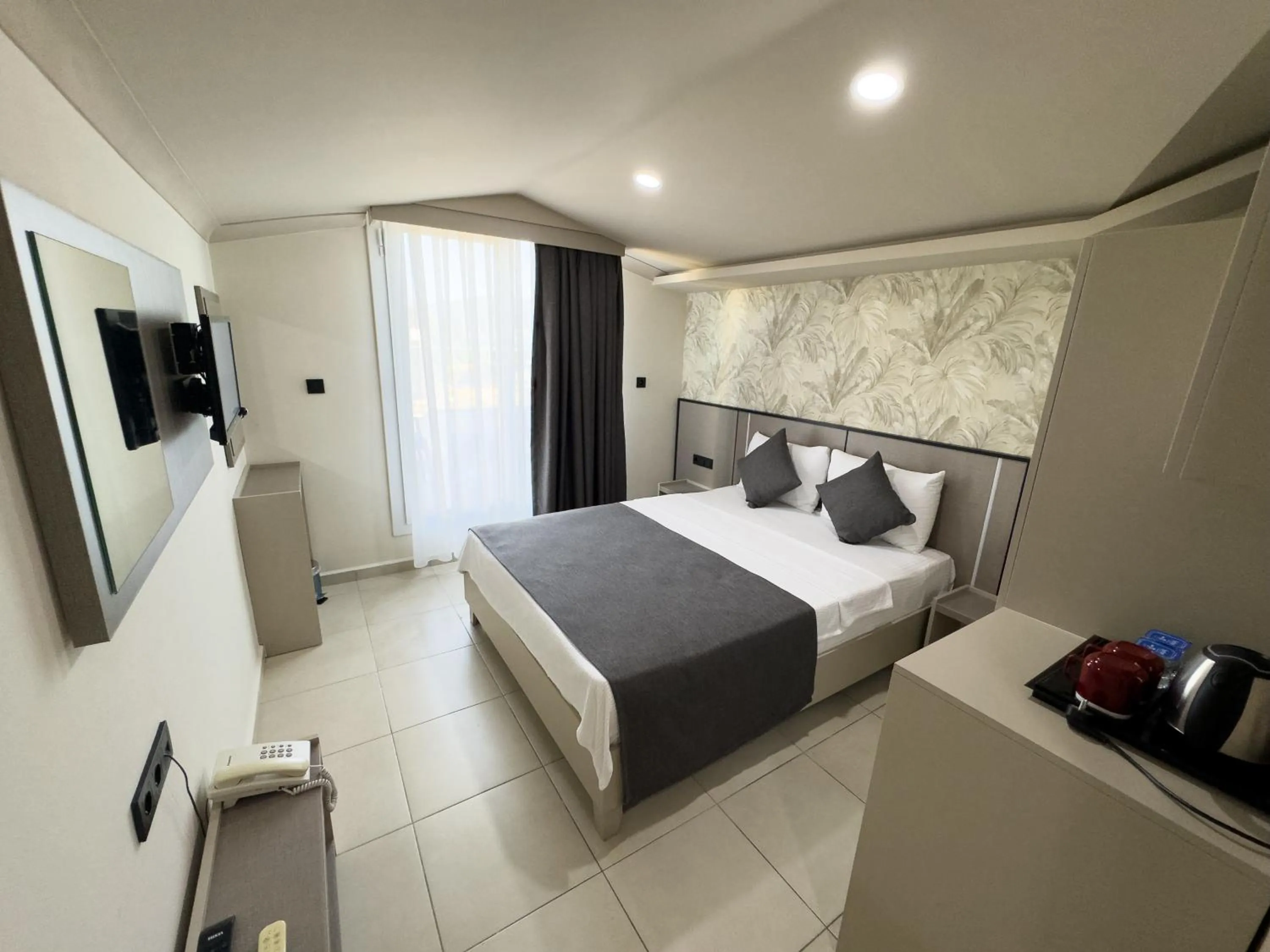 Bed in Sardunya Hotel