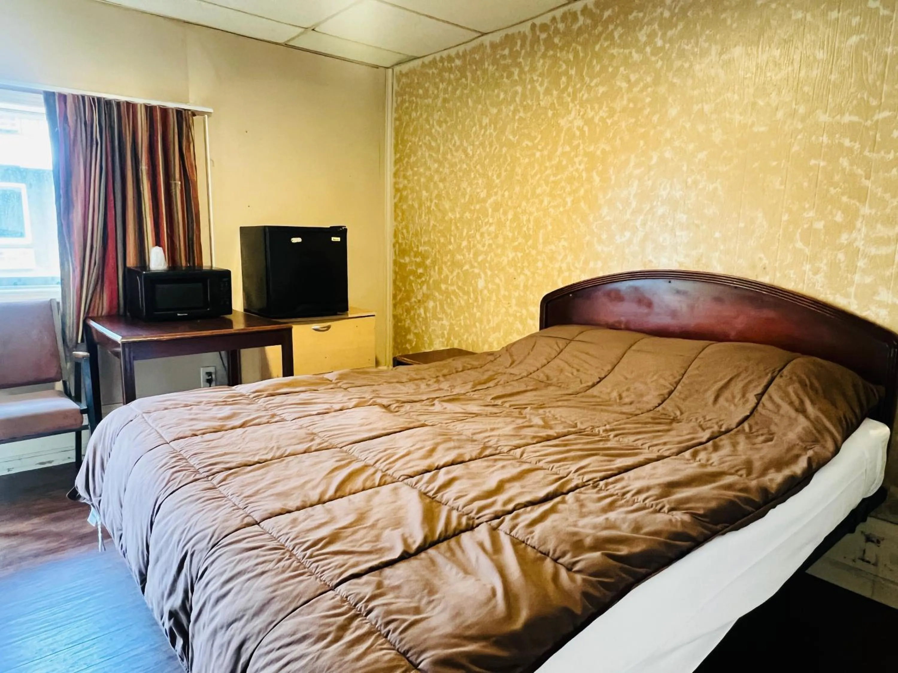 Bedroom in Hotel O East Hemphill Burton-Flint