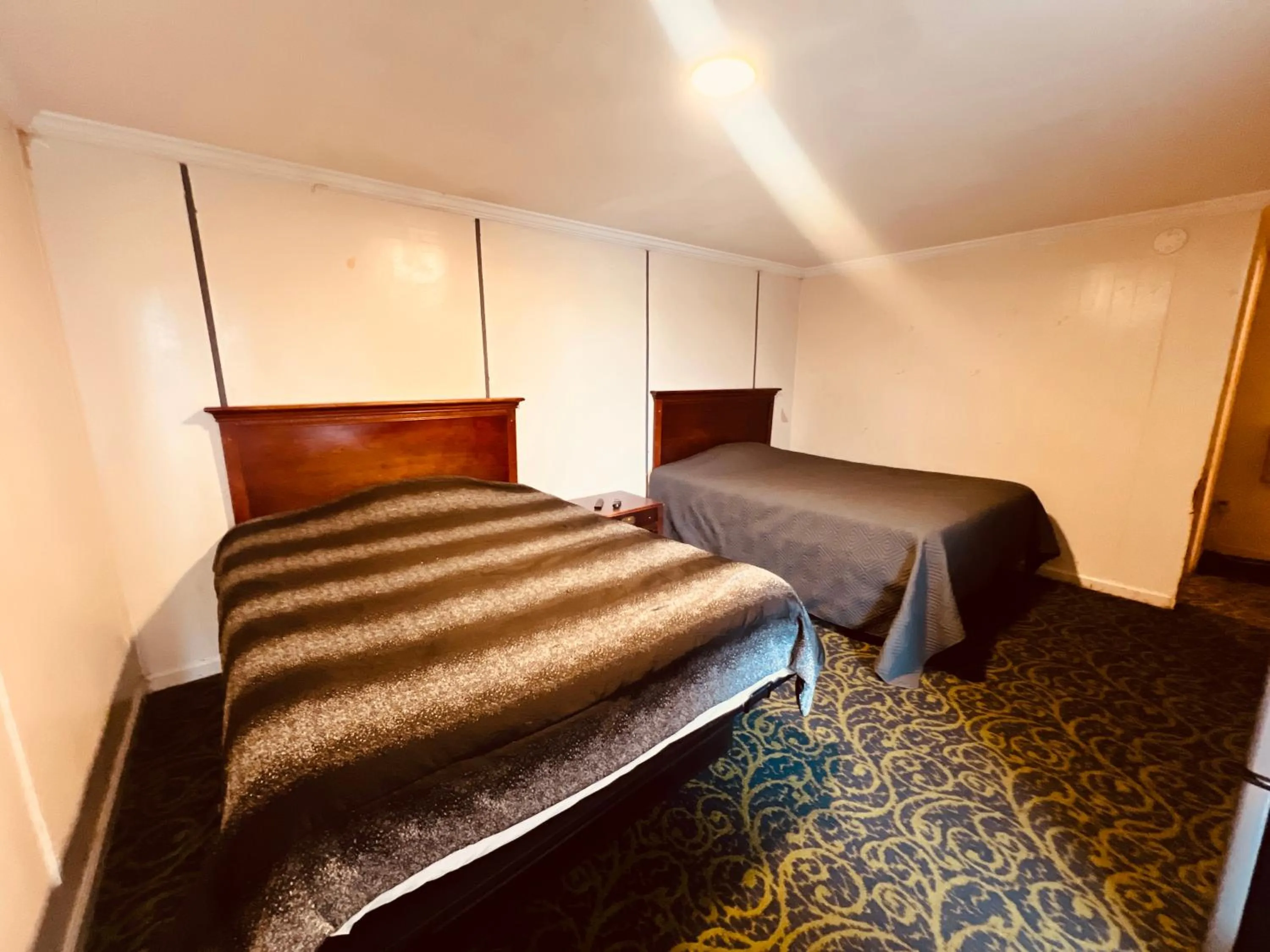 Bedroom in Hotel O East Hemphill Burton-Flint