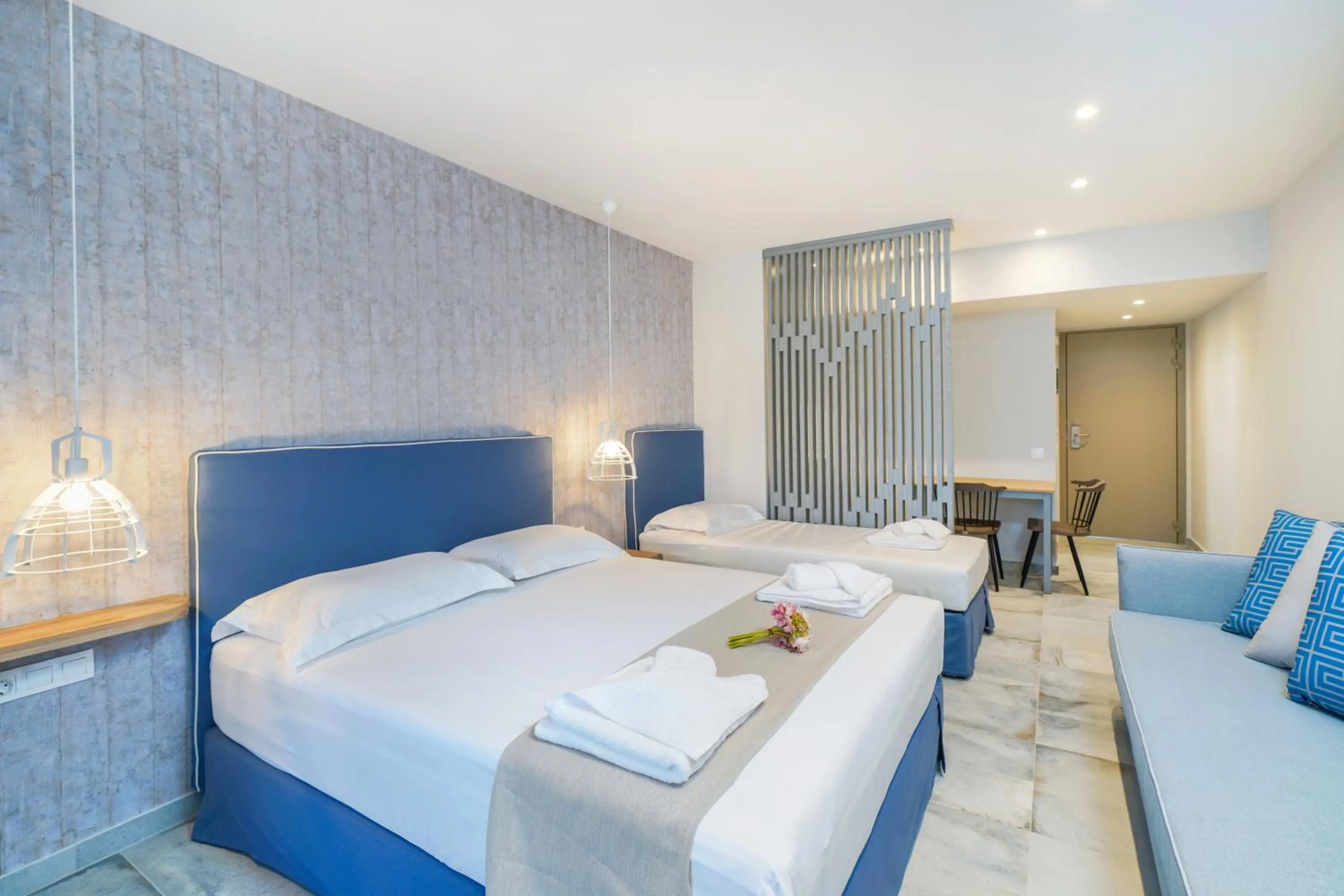 Photo of the whole room, Bed in Iliomagic Luxury Suites Thassos