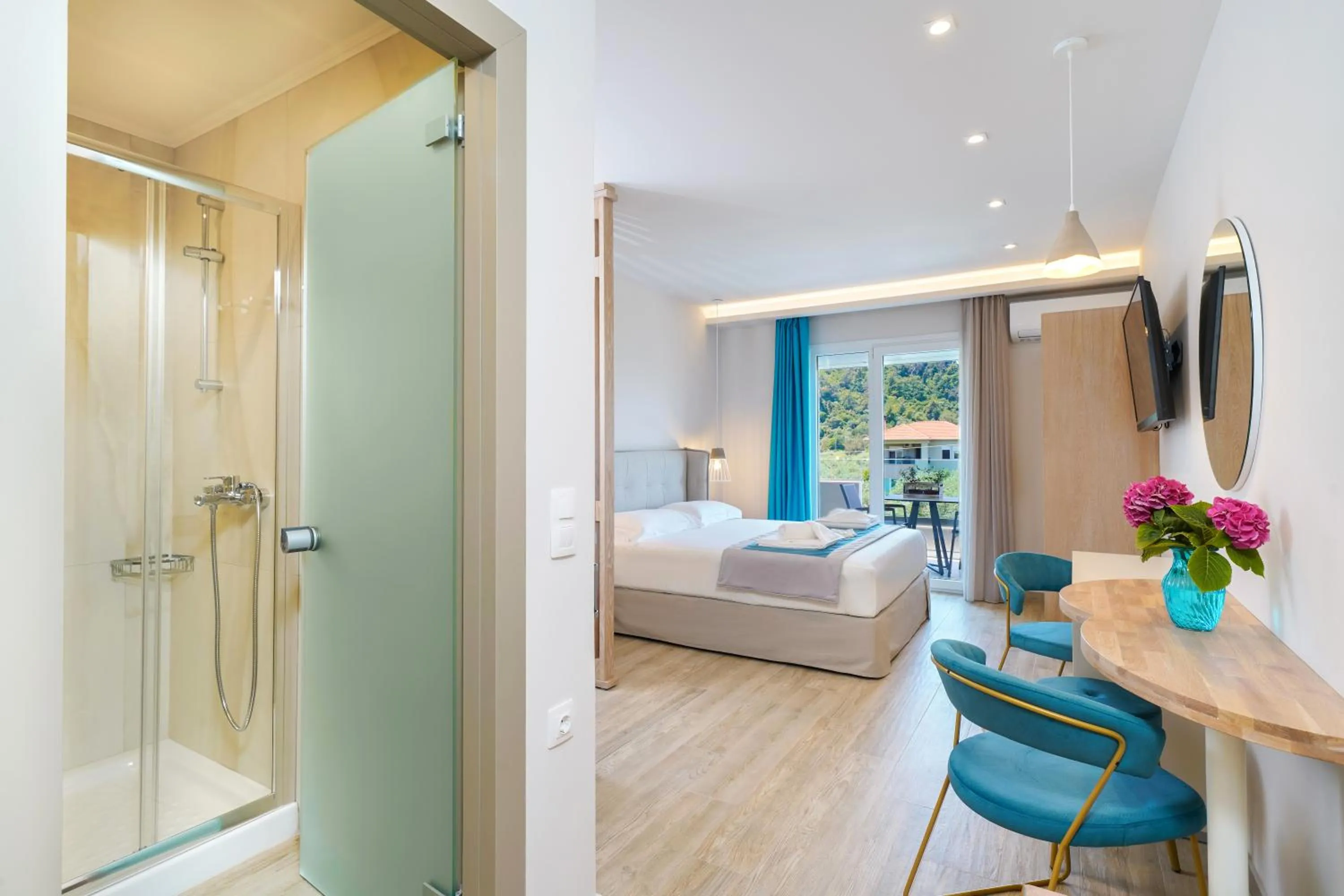 Photo of the whole room, Bed in Iliomagic Luxury Suites Thassos