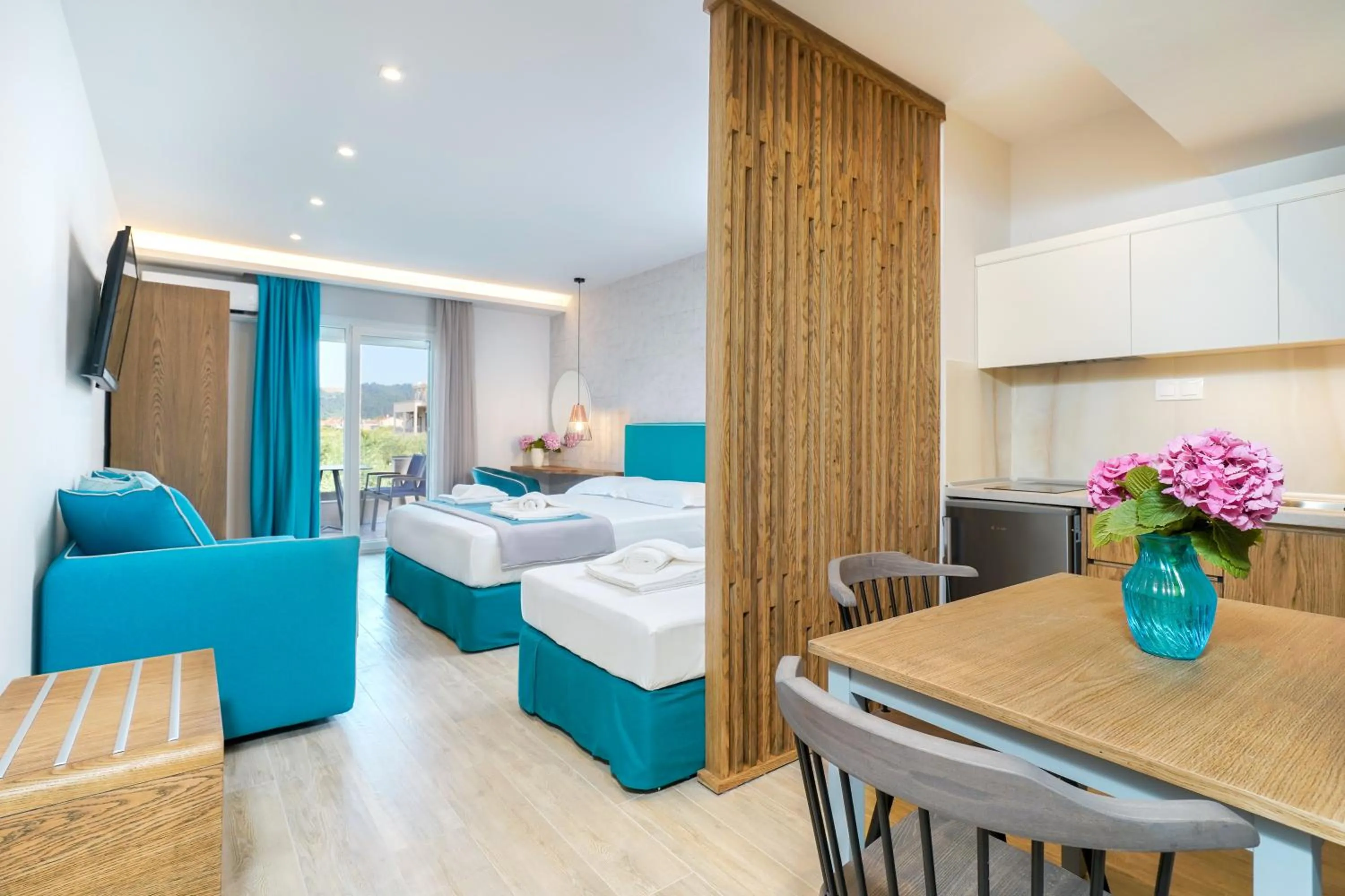 Photo of the whole room, Bed in Iliomagic Luxury Suites Thassos