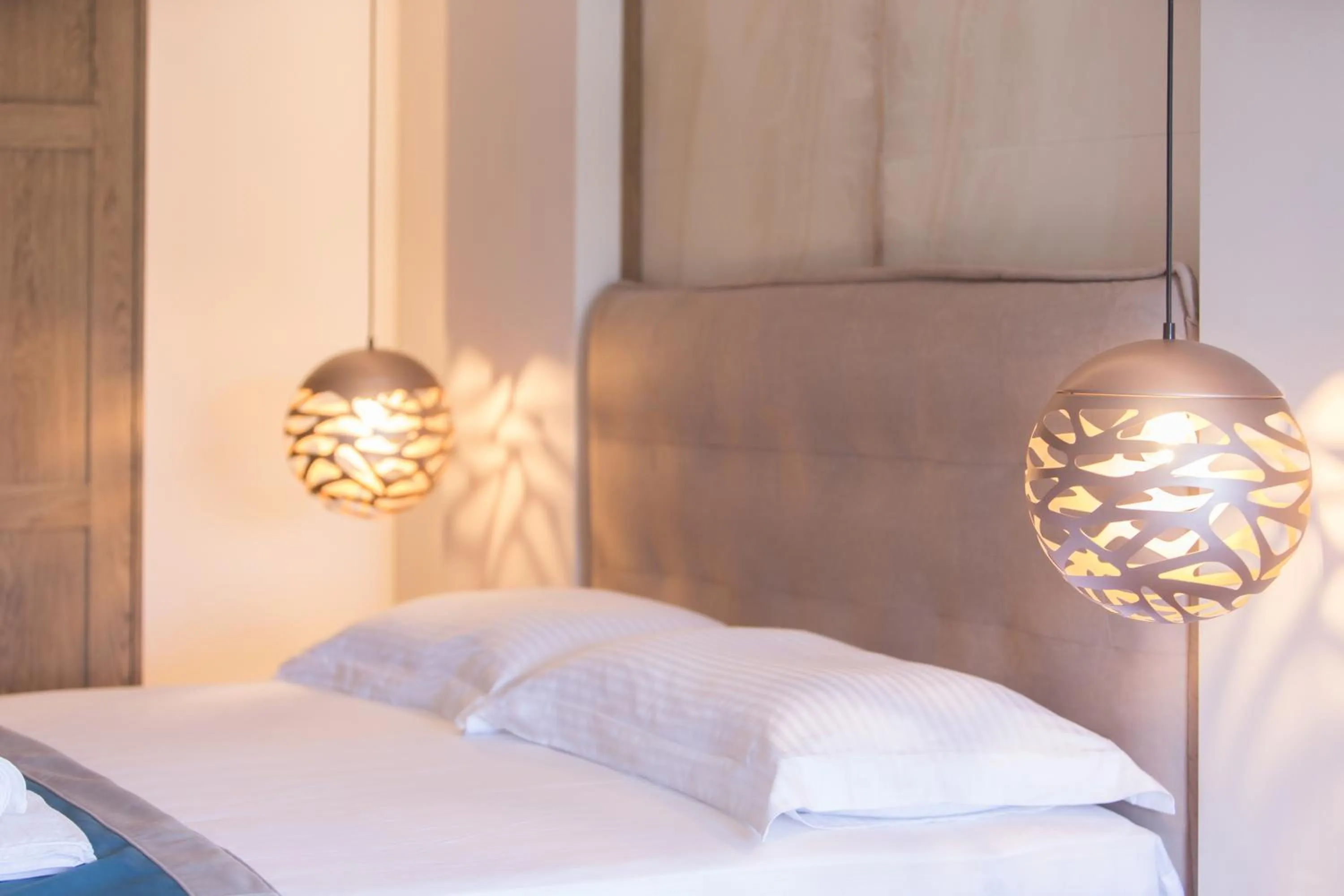 Bed in Iliomagic Luxury Suites Thassos