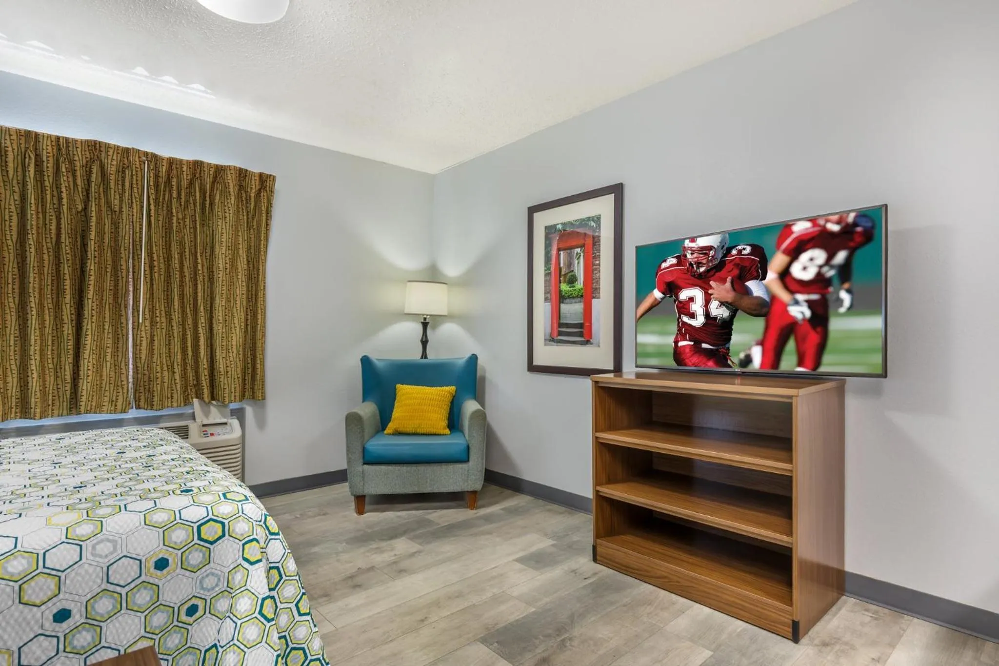 Photo of the whole room, Bed in HomeTowne Studios & Suites by Red Roof Greensboro