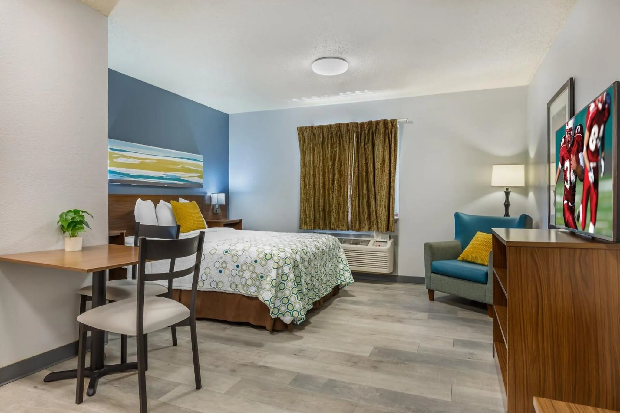 Photo of the whole room, Bed in HomeTowne Studios & Suites by Red Roof Greensboro