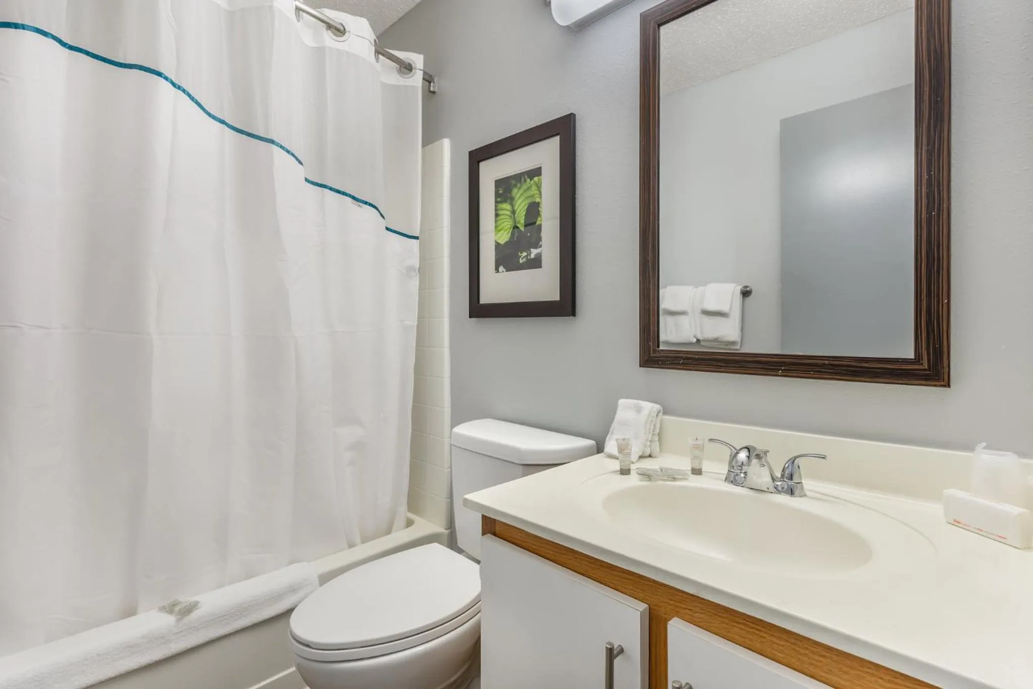 Bathroom in HomeTowne Studios & Suites by Red Roof Greensboro