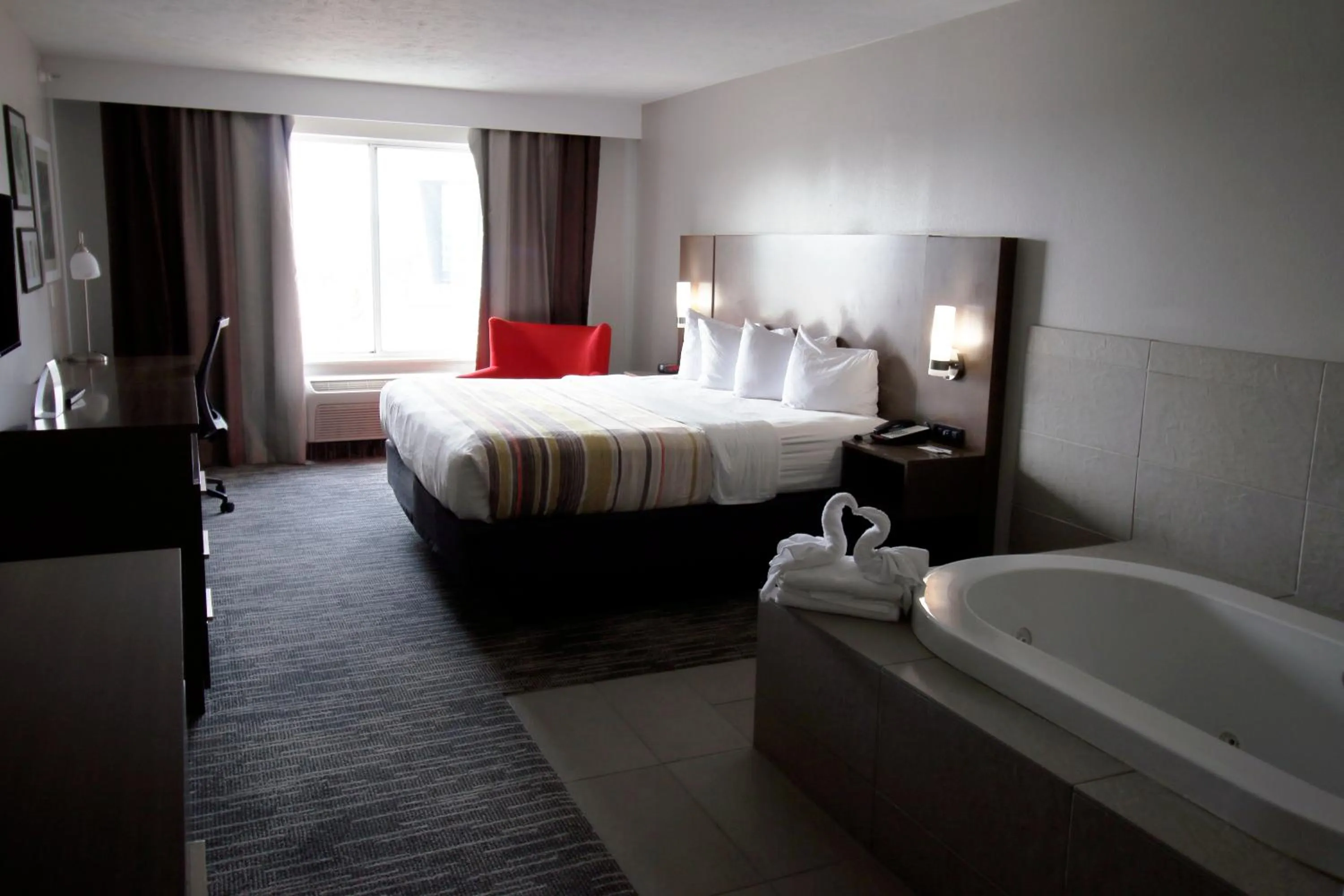 Bed in Country Inn & Suites by Radisson, Council Bluffs, IA