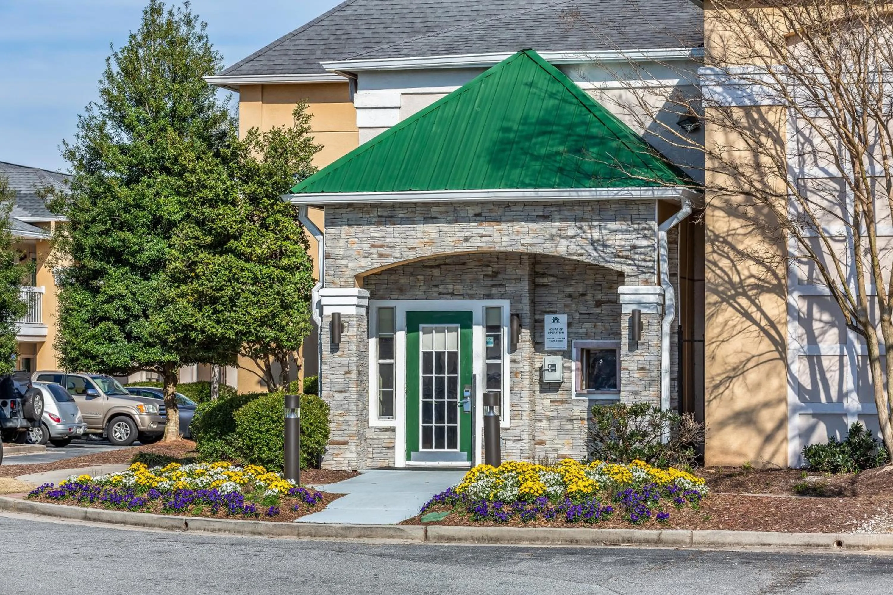 Property building in HomeTowne Studios by Red Roof - Atlanta NE - Peachtree Corners