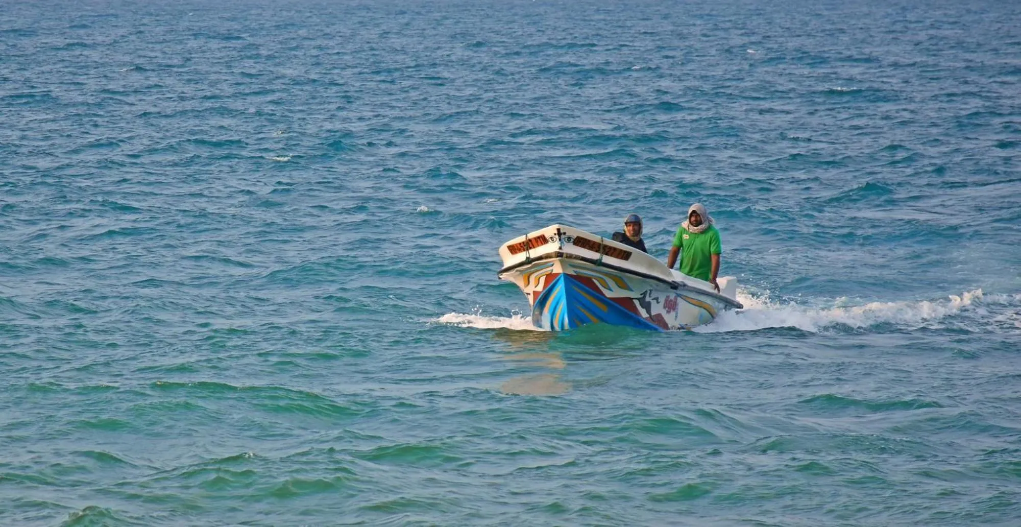 People in Melheim Beach Kalpitiya