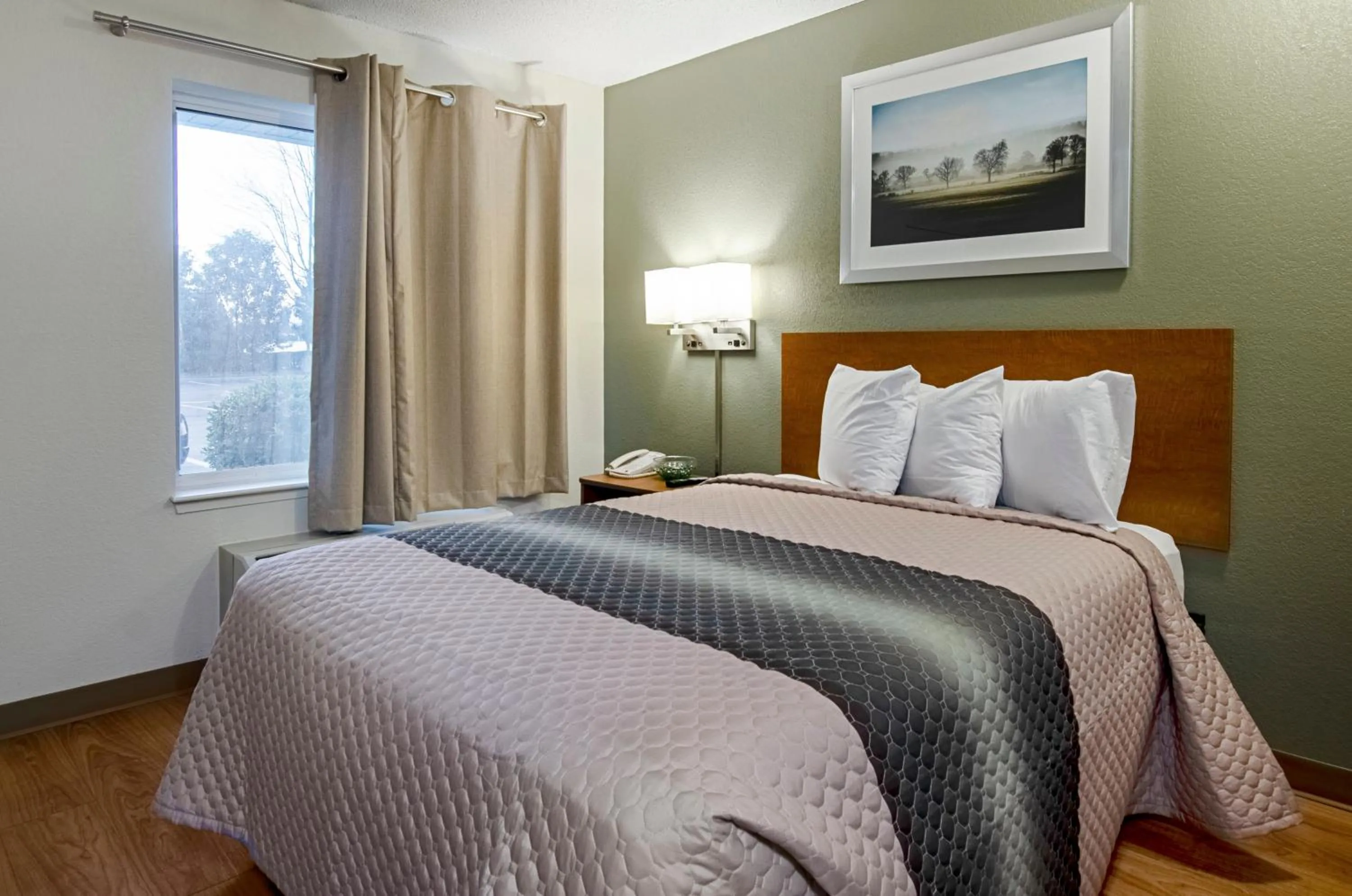 Photo of the whole room, Bed in HomeTowne Studios by Red Roof Winston-Salem - University Pkwy