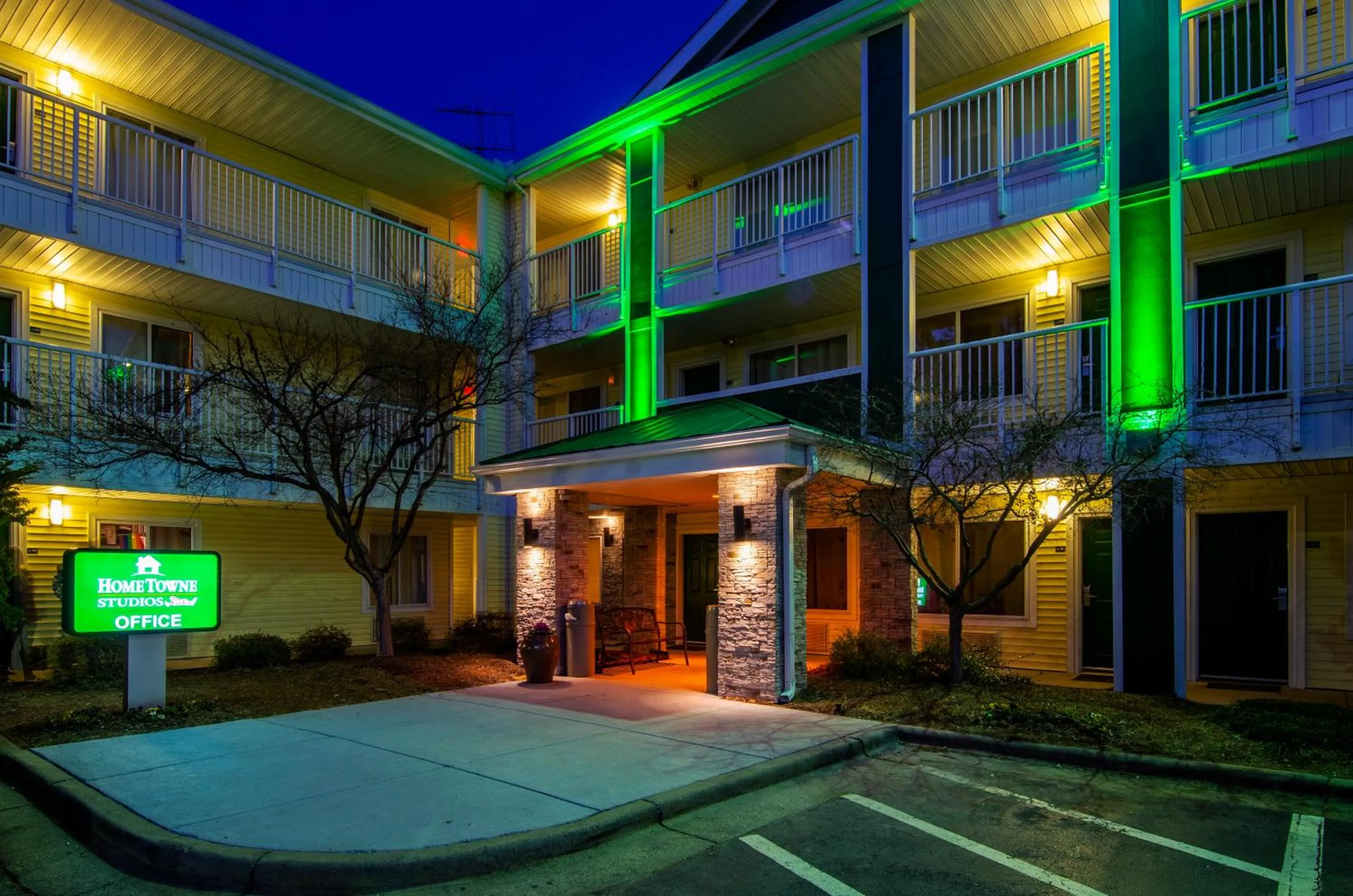 Property building in HomeTowne Studios by Red Roof Winston-Salem - University Pkwy