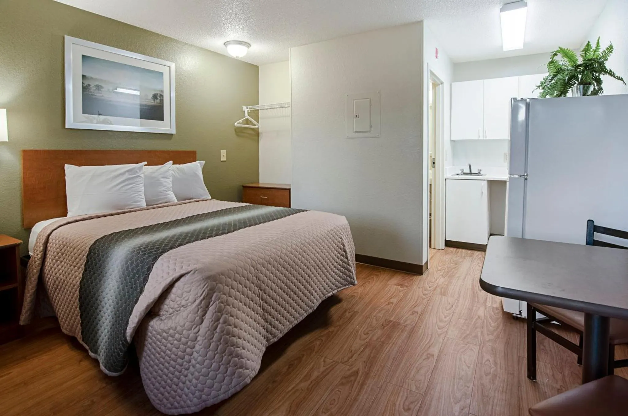 Photo of the whole room, Bed in HomeTowne Studios by Red Roof Winston-Salem - University Pkwy