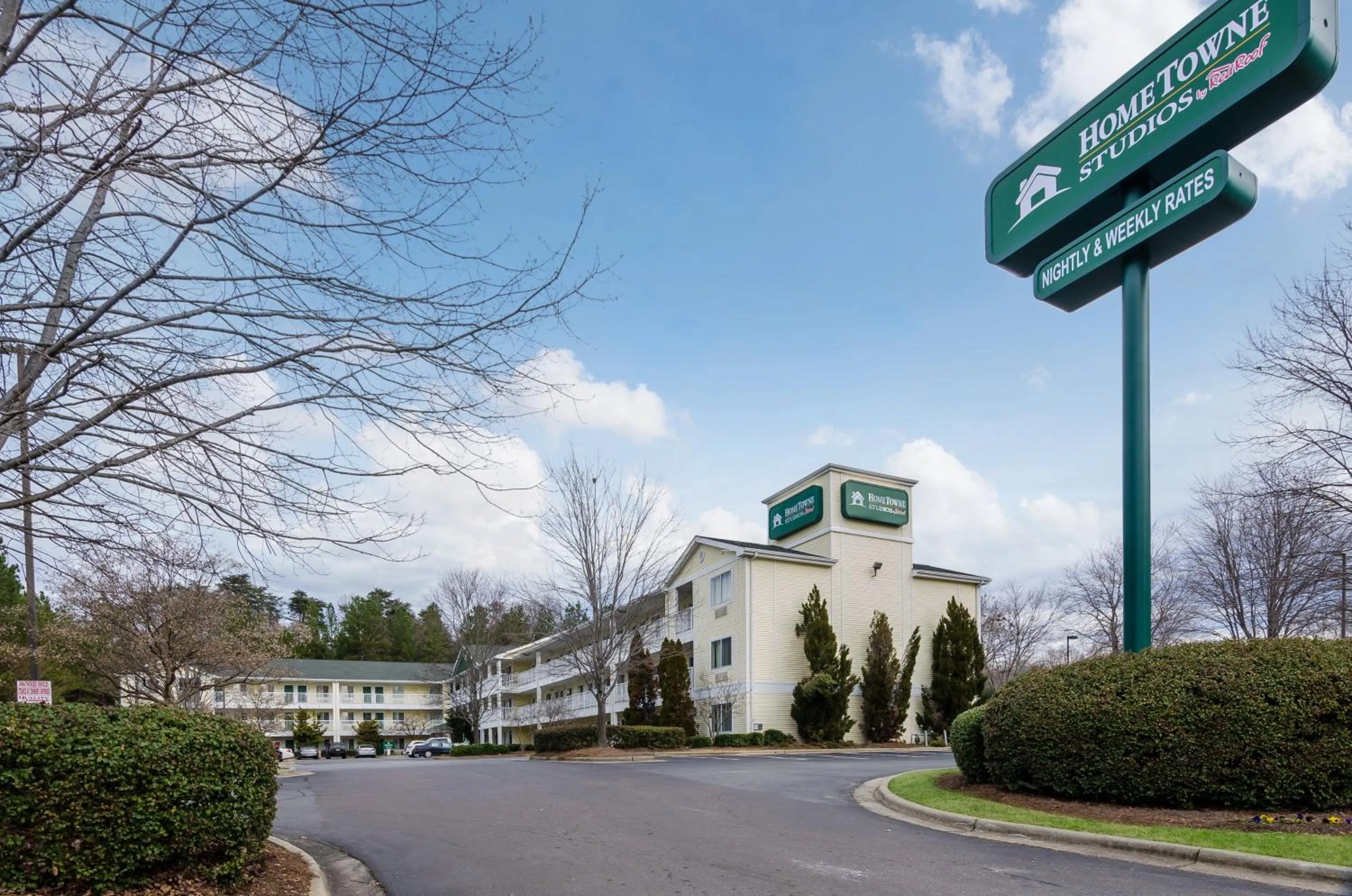 Property building in HomeTowne Studios by Red Roof Winston-Salem - University Pkwy