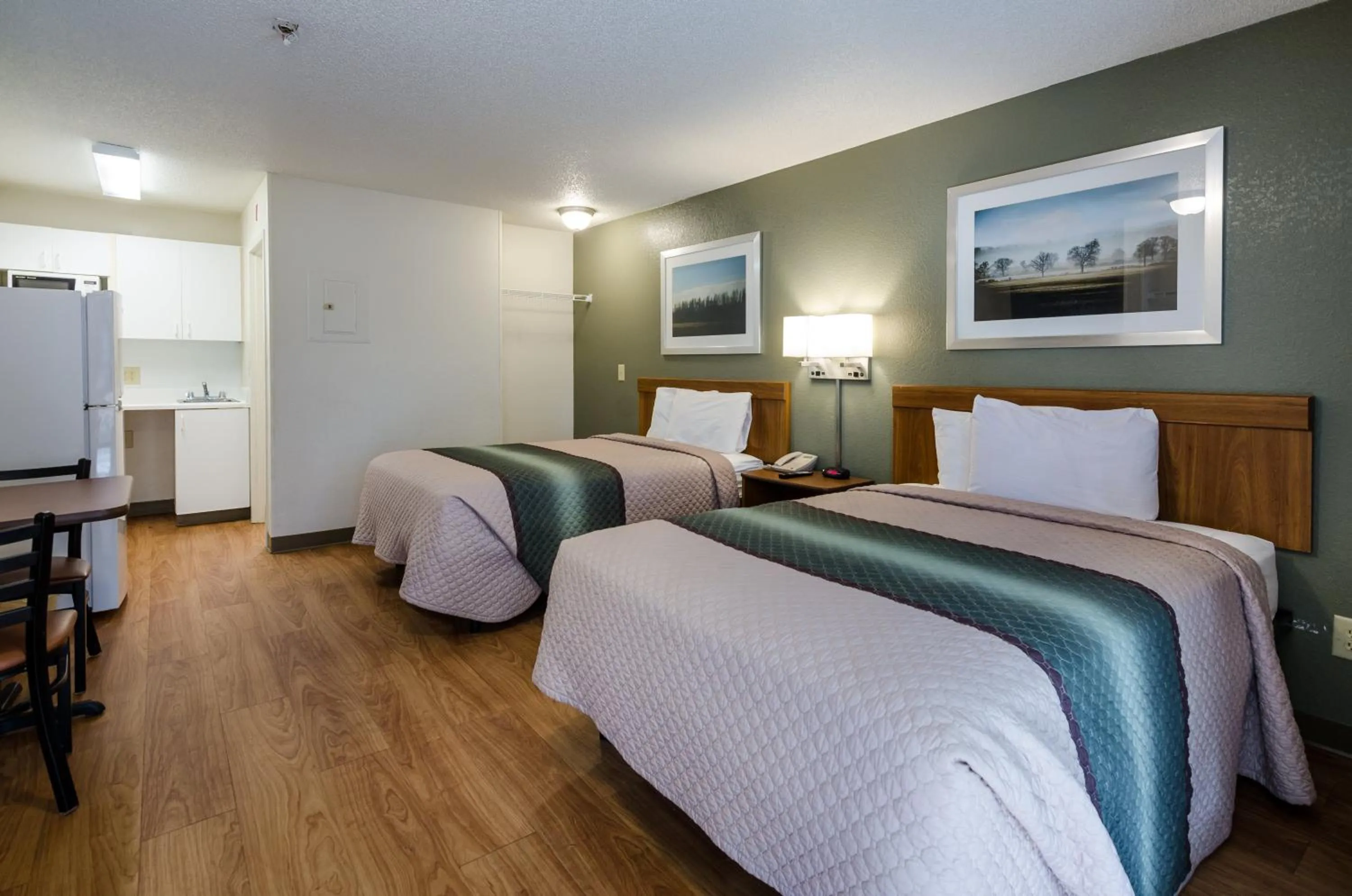 Photo of the whole room, Bed in HomeTowne Studios by Red Roof Winston-Salem - University Pkwy